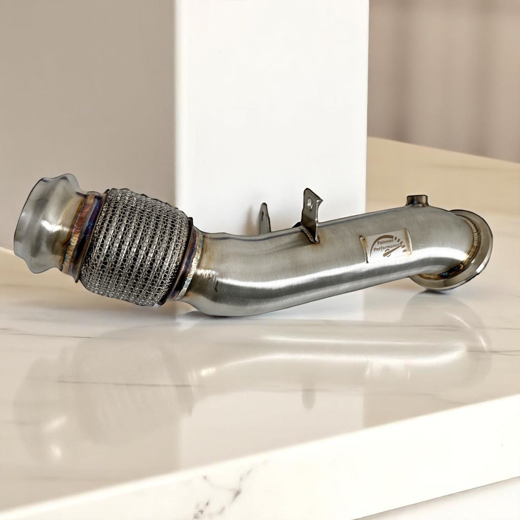 Palenon Performance B46 B48 racing downpipe made of 304 stainless steel with a flexible braided section