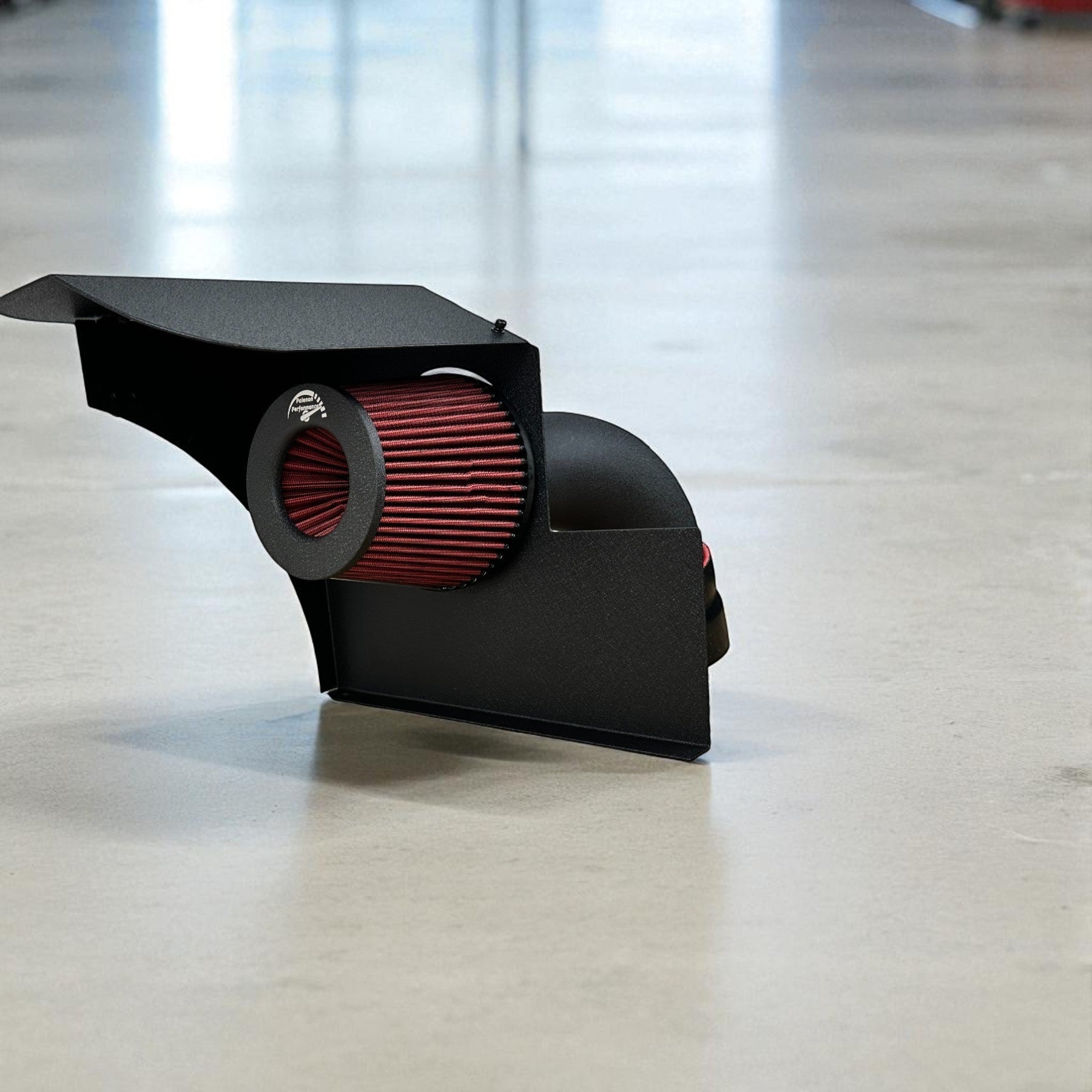 Palenon Performance B58 cold air intake with red cotton filter and black heat shield for BMW F-chassis models.