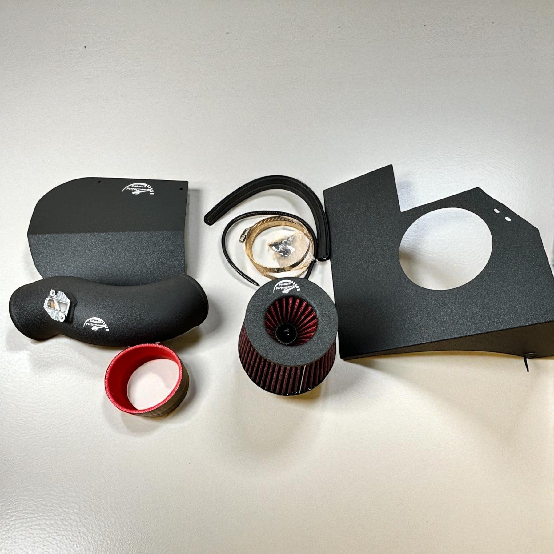 Palenon Performance B58 cold air intake kit for BMW F-chassis, featuring a black intake tube, red filter, and shields