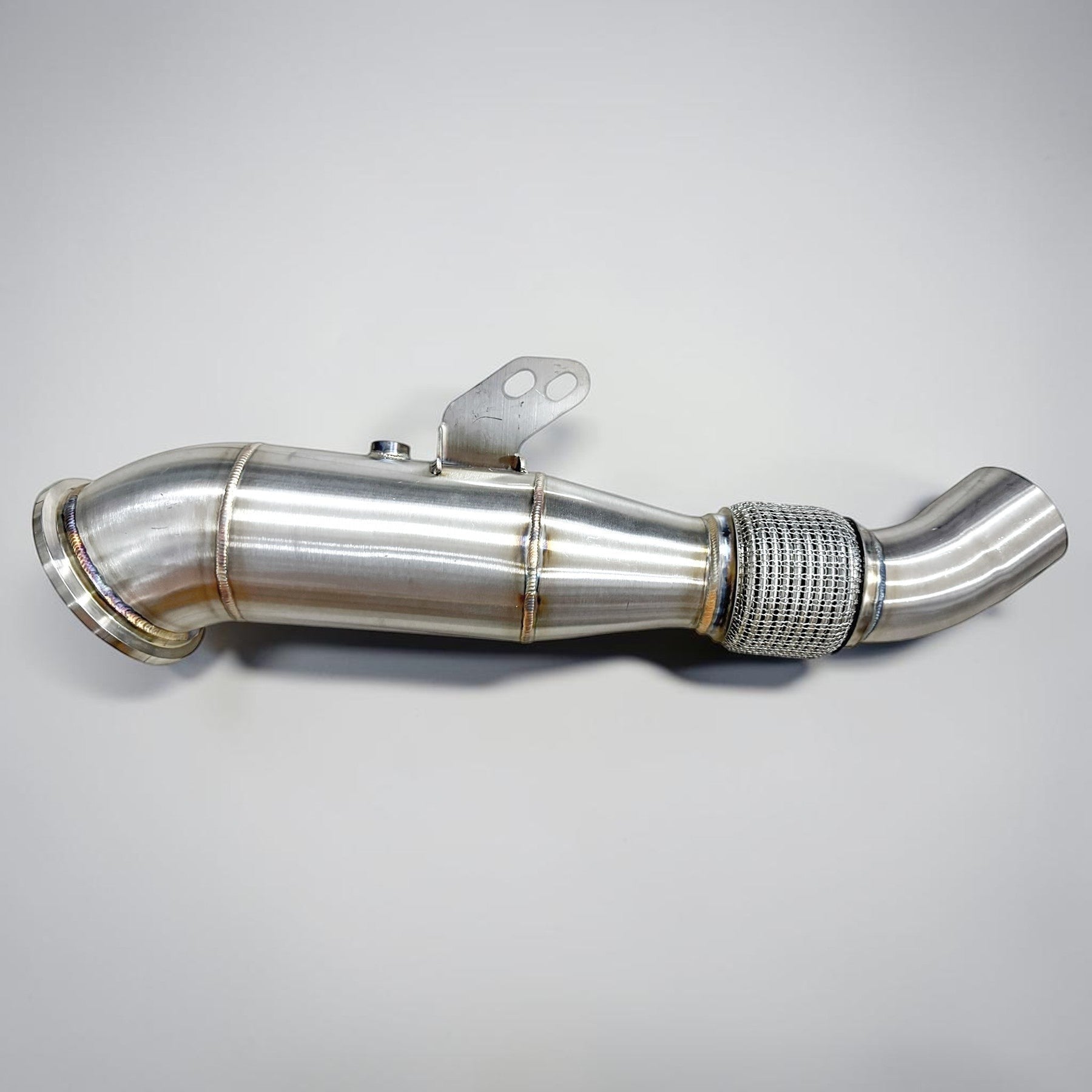 Palenon Performance 4.5-inch stainless steel racing downpipe for BMW B58 engines, featuring a flexible braided section.