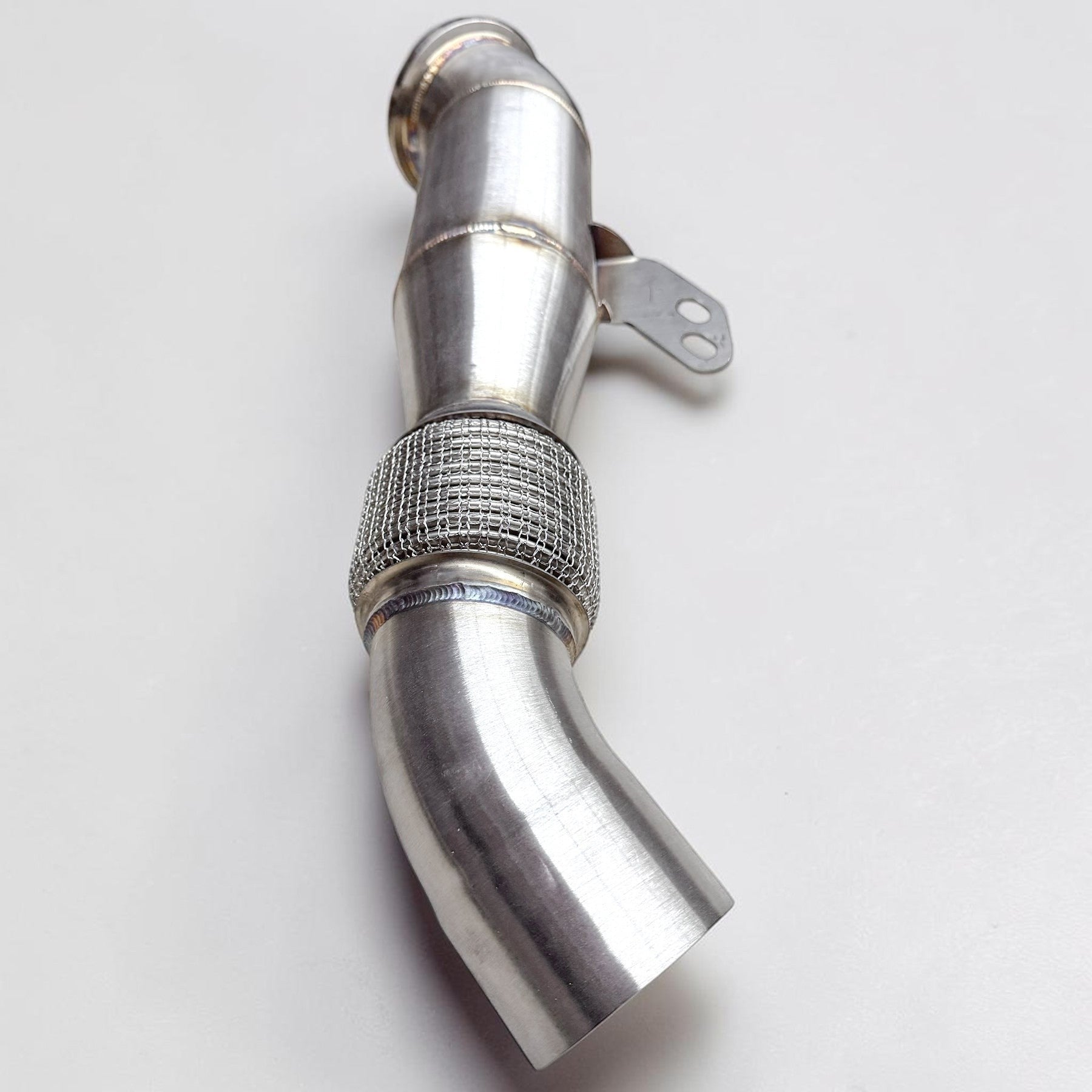Palenon Performance 4.5-inch stainless steel racing downpipe for BMW B58 engines with flexible mesh section.
