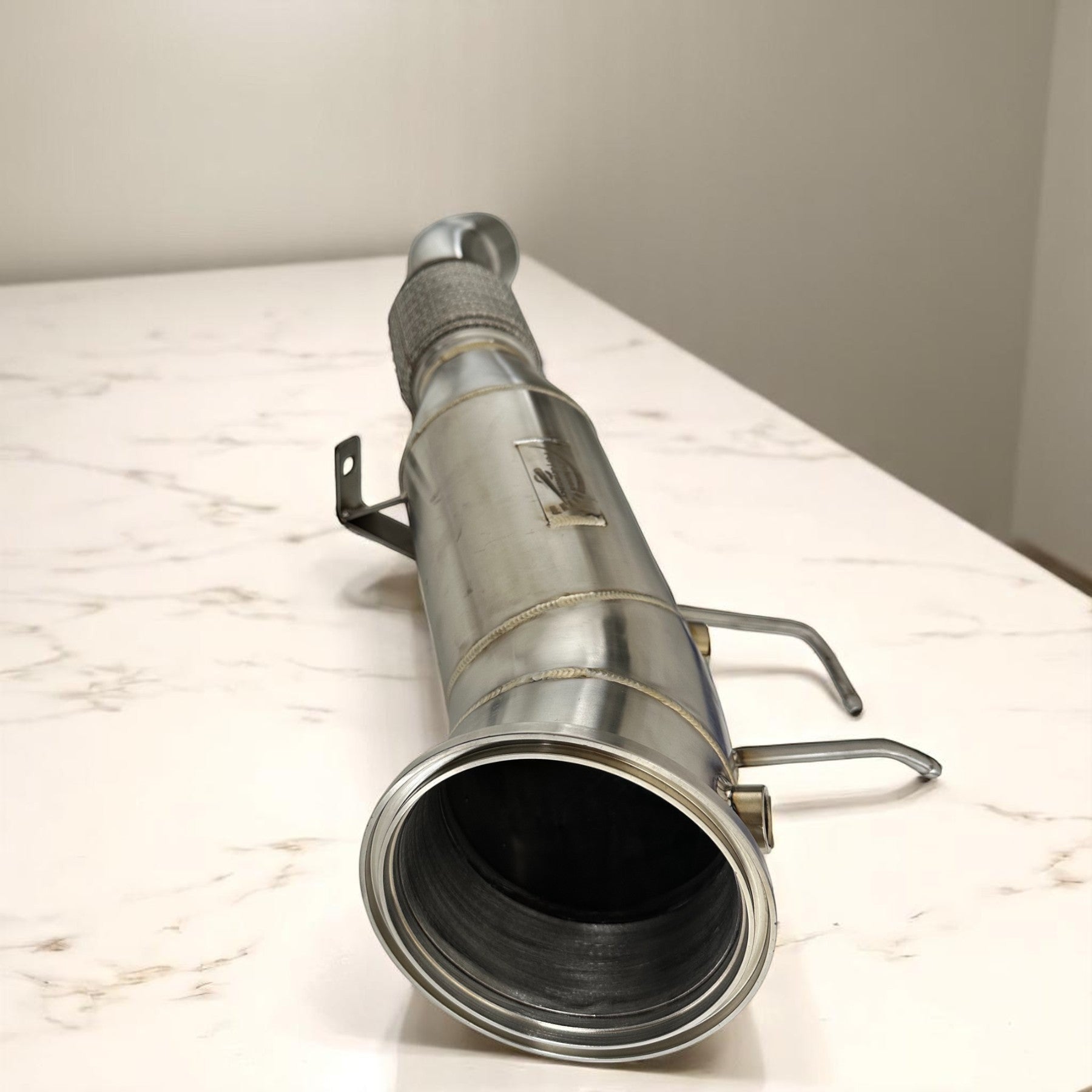 Palenon Performance 5-inch stainless steel racing downpipe for BMW B58TU2 engines with TIG welded flex joint.