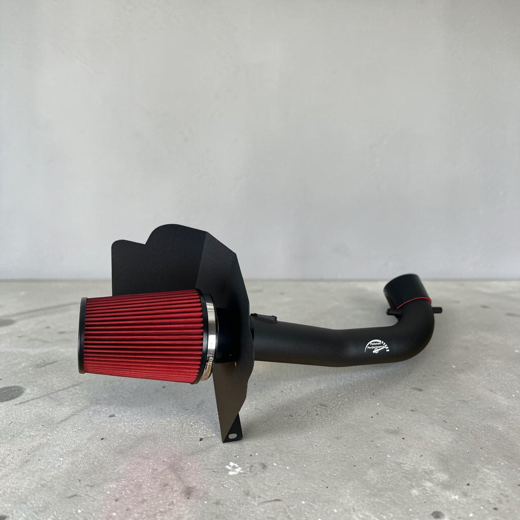 Palenon Performance cold air intake system with a red high-flow filter and black intake tube for Silverado and Sierra.