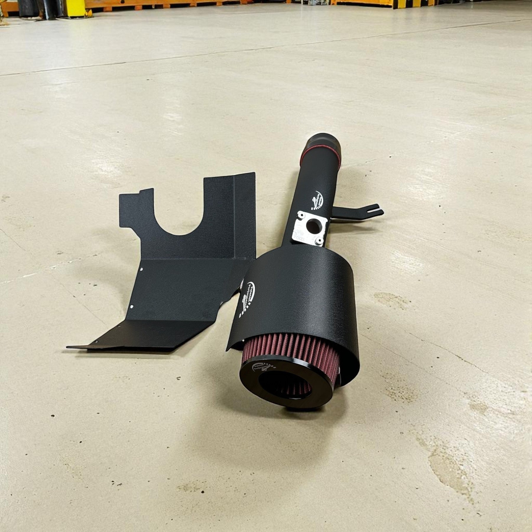 Palenon Performance cold air intake kit with black aluminum piping, heat shield, and high-flow red air filter.