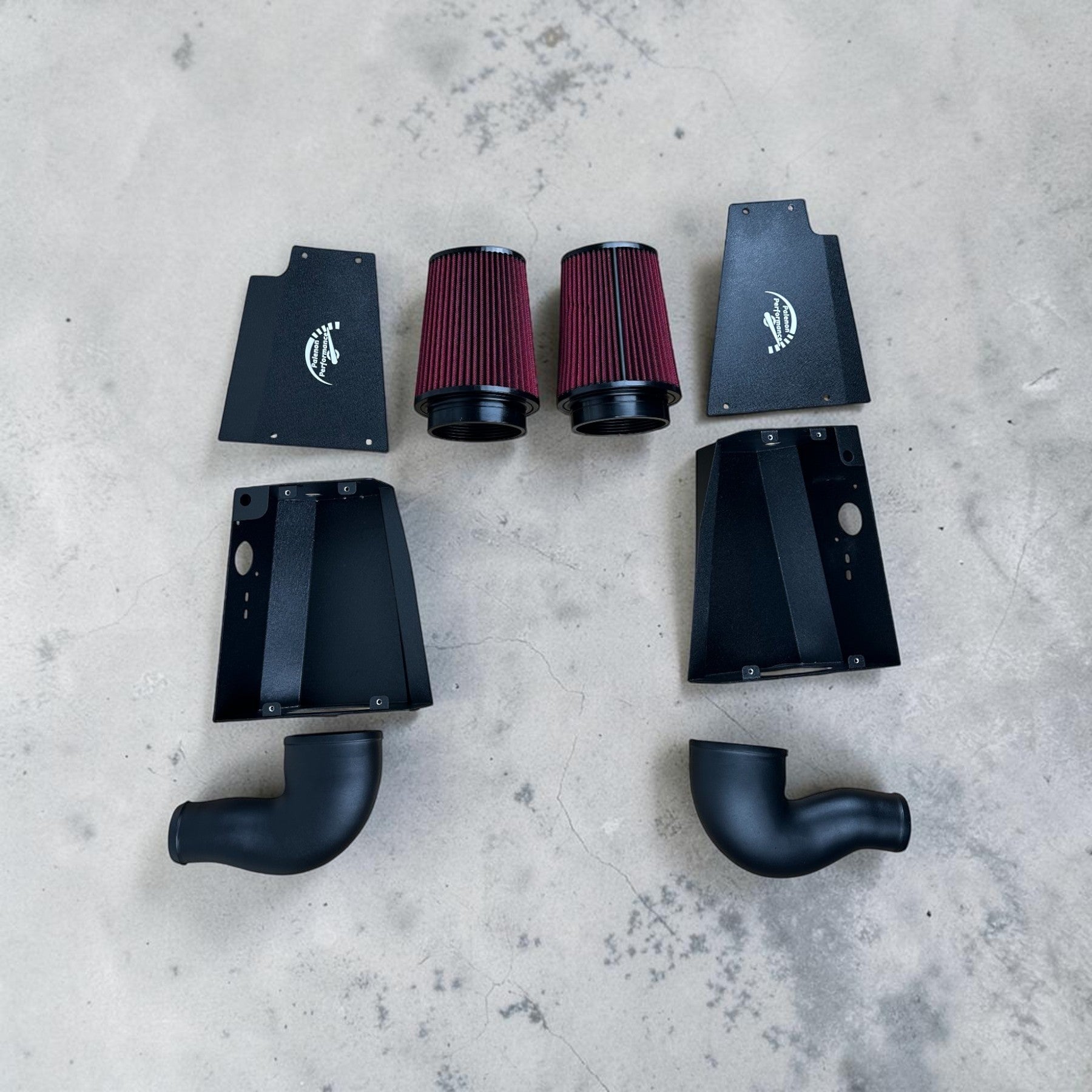 Palenon Performance dual cold air intake system for Mercedes M177 engines with red filters and black heat shields.