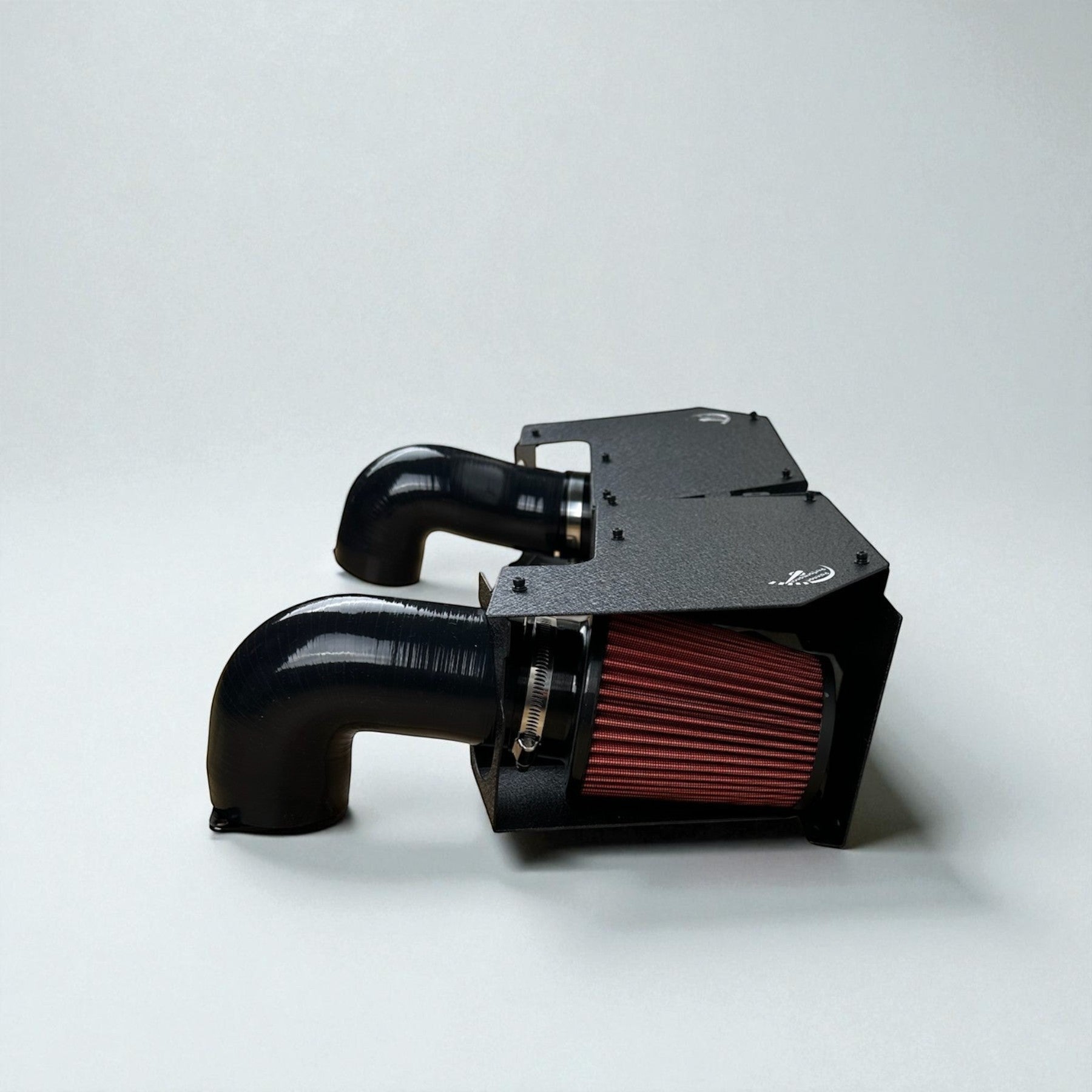 Palenon Performance dual cold air intake system with black powder-coated heat shields and red reusable air filters.