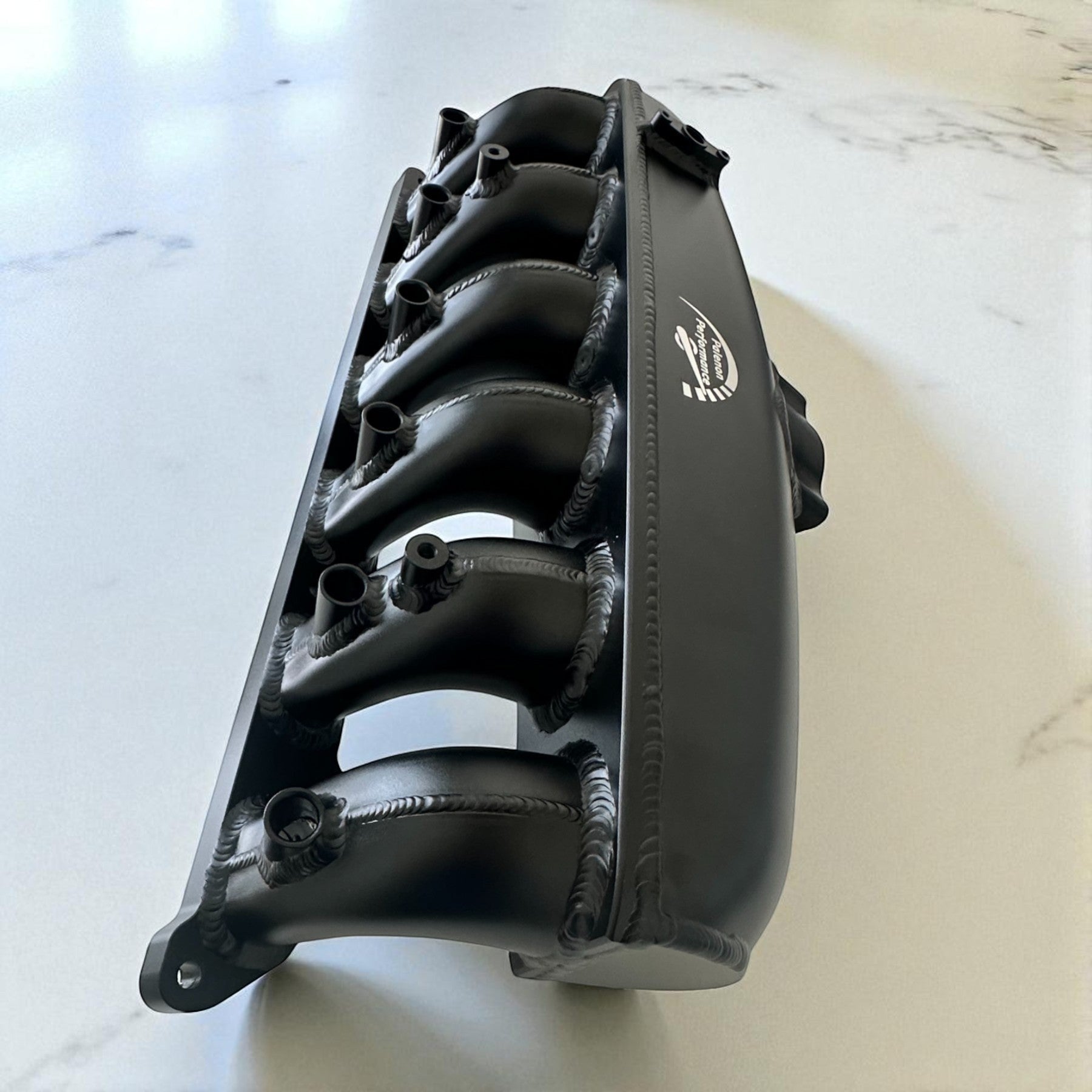 Palenon Performance black aluminum intake manifold for BMW N54 engines with integrated port injection bungs