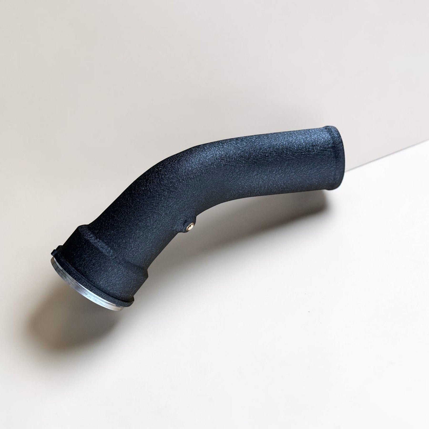 Palenon Performance N55 aluminum charge pipe with a wrinkle black powder-coated finish and CNC-machined flange.
