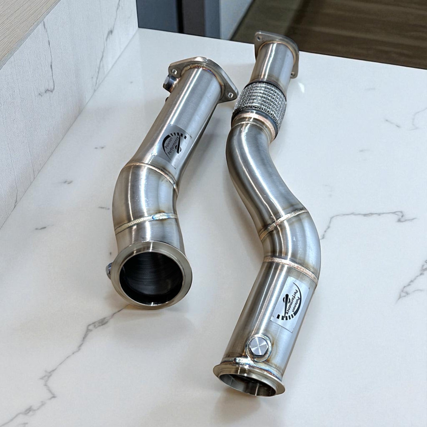 Palenon Performance stainless steel catless S58 race downpipes for BMW G80 M3, G82 M4, and G87 M2 performance upgrades.