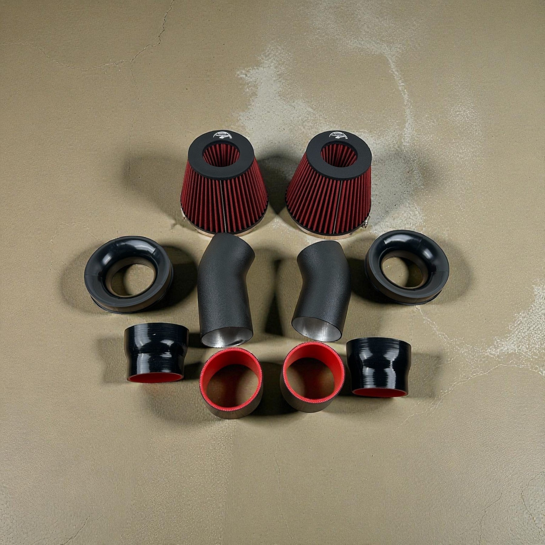 Palenon Performance S63 cold air intake kit with black aluminum pipes, red velocity stack filters, and silicone couplers.