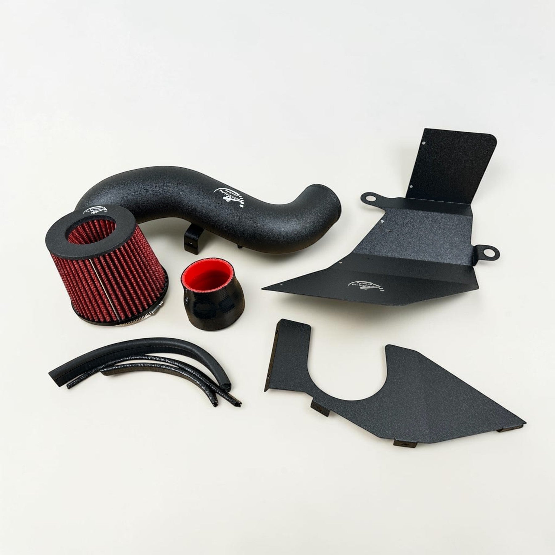 Palenon Performance cold air intake kit for VW MK7 with black aluminum piping, red cone filter, and heat shield.