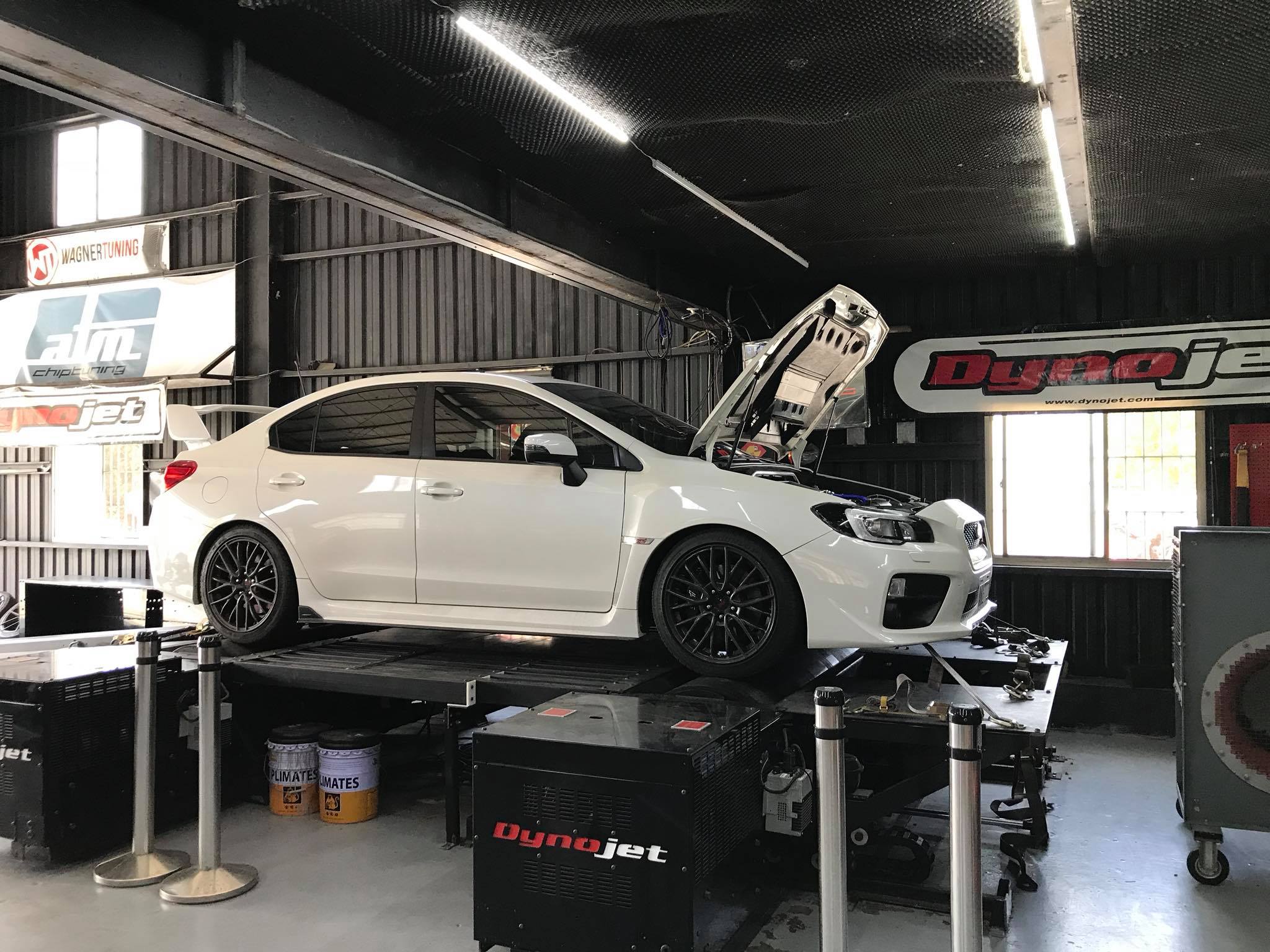 Subaru Sti car in automobile workshop