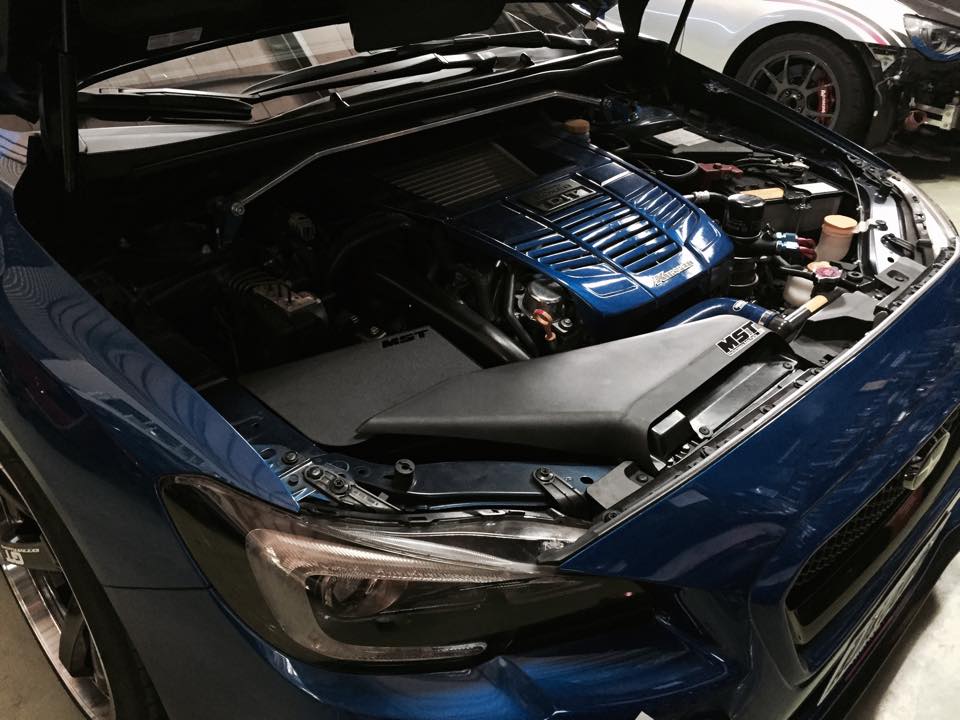 Subaru WRX 2.0L Cold Air Intake System installation in car workshop