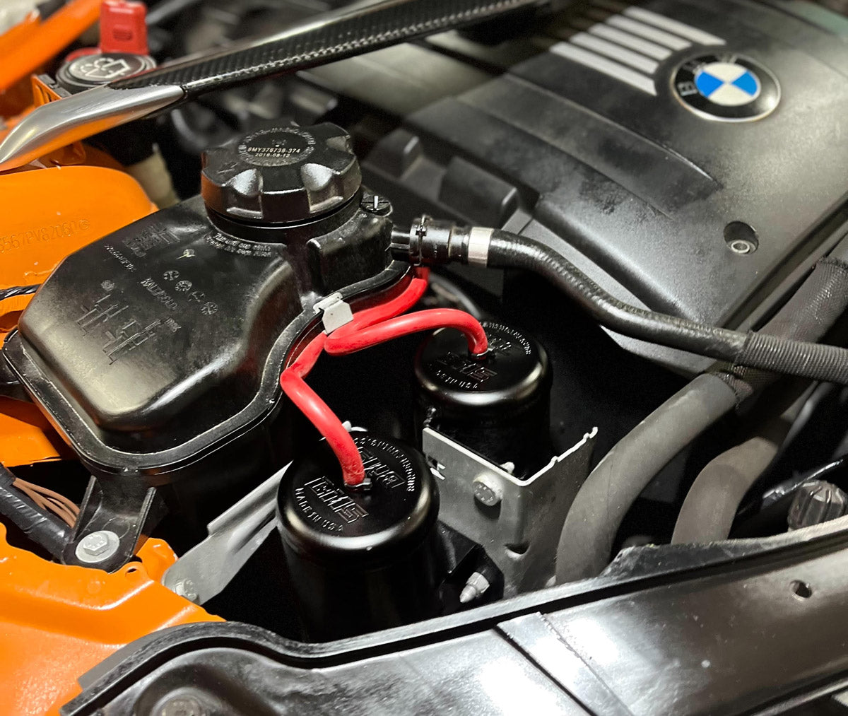 Billet Upgraded N54 BMW Boost Vacuum Tanks installation close view