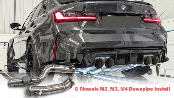 Install downpipes for your G80 M3, G82 M4, G87 M2 with precision – rear view of BMW G80 M3 showcasing aftermarket exhaust system and performance downpipes