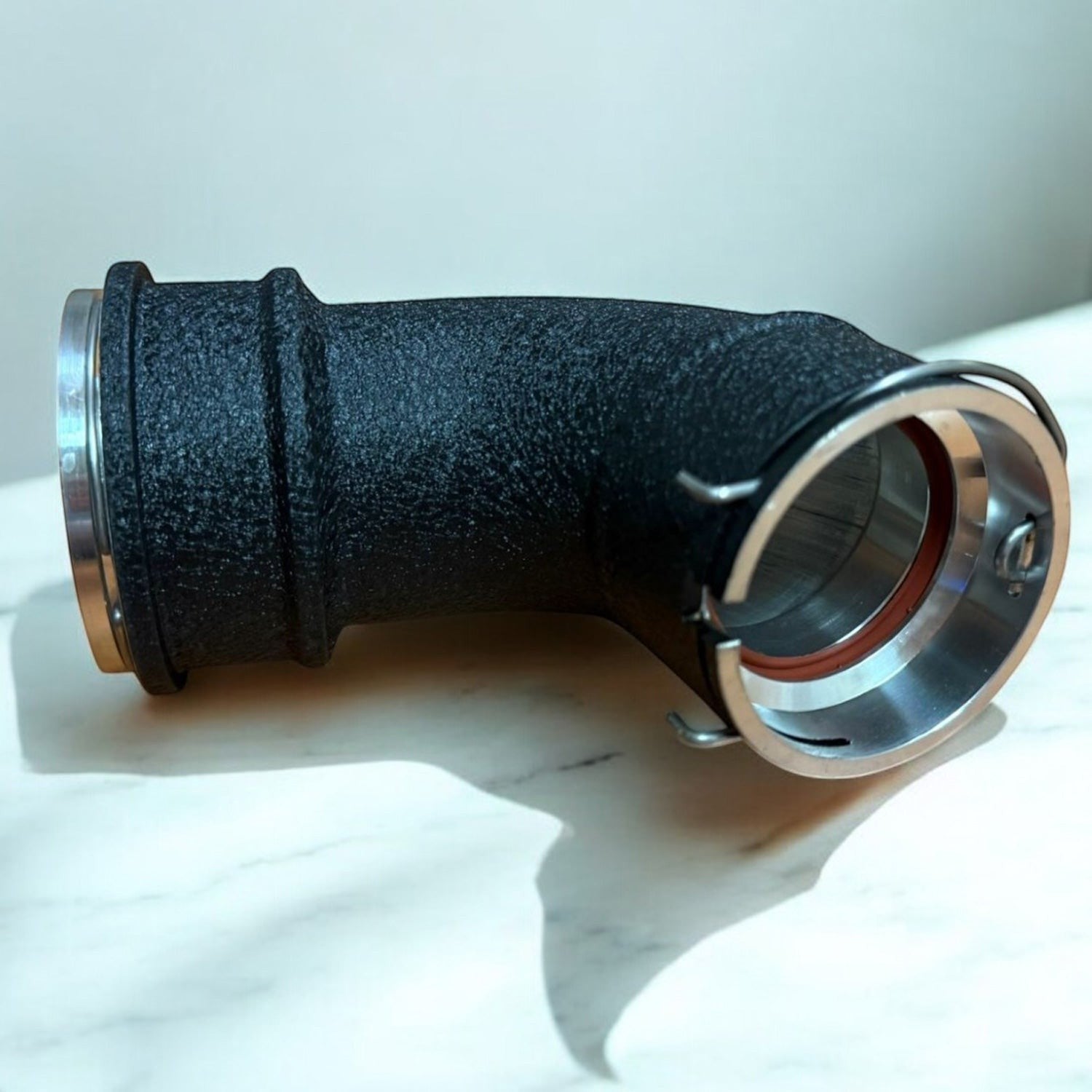 Palenon Performance black aluminum S58 charge pipe with CNC-machined flanges for BMW G8X and F9X M-series engines.