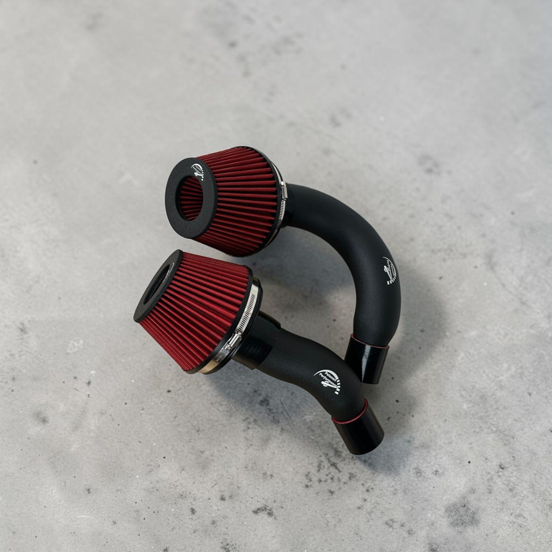 Palenon Performance cold air intake system with red cone filters and black aluminum pipes for Audi C7 4.0T engines.
