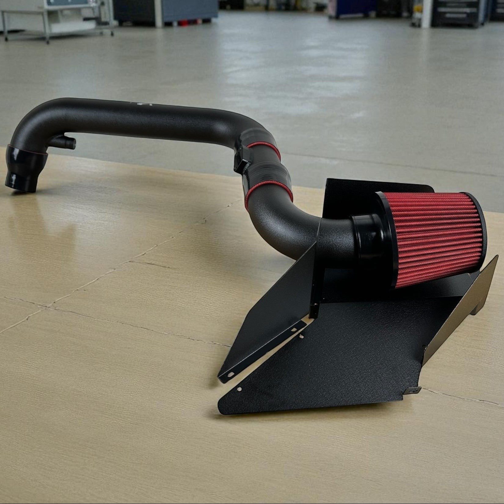 Palenon Performance cold air intake for Audi A3 S3 8P with black aluminum piping, red air filter, and heat shield.