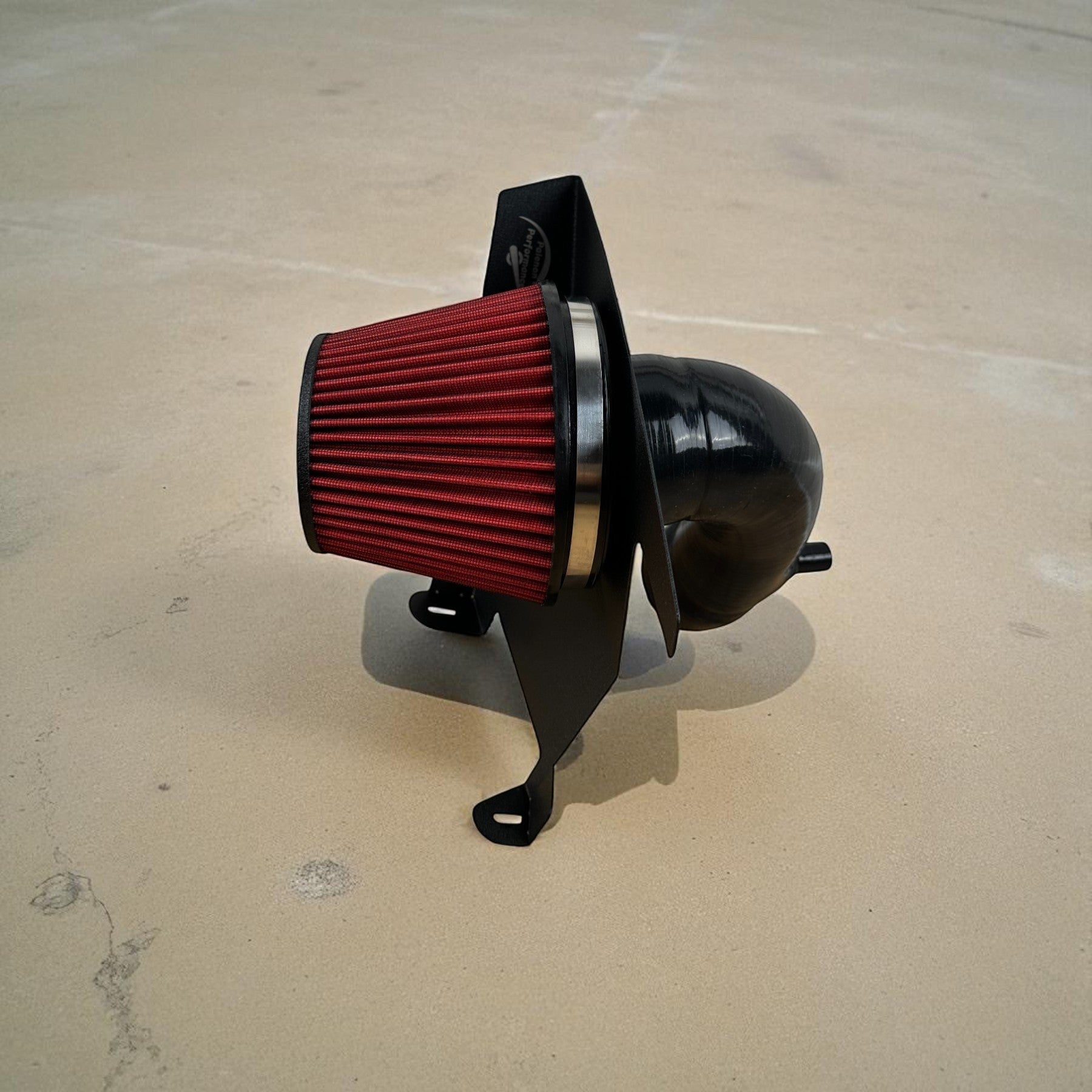 Palenon Performance cold air intake system with a red conical air filter, black heat shield, and silicone intake pipe.