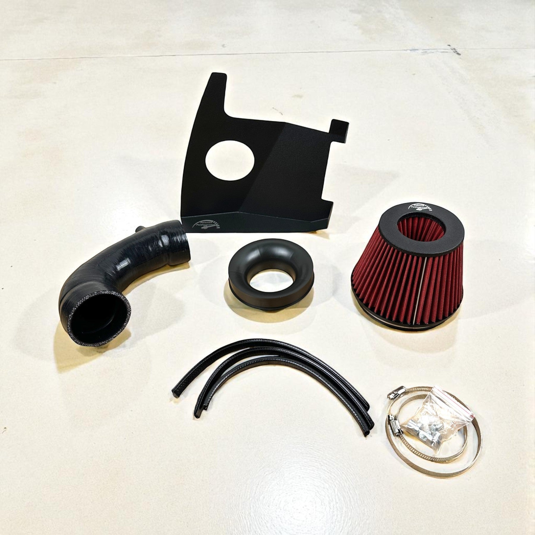 Palenon Performance cold air intake kit for Audi B9 A4 A5 featuring a red air filter, black heat shield, and silicone pipe