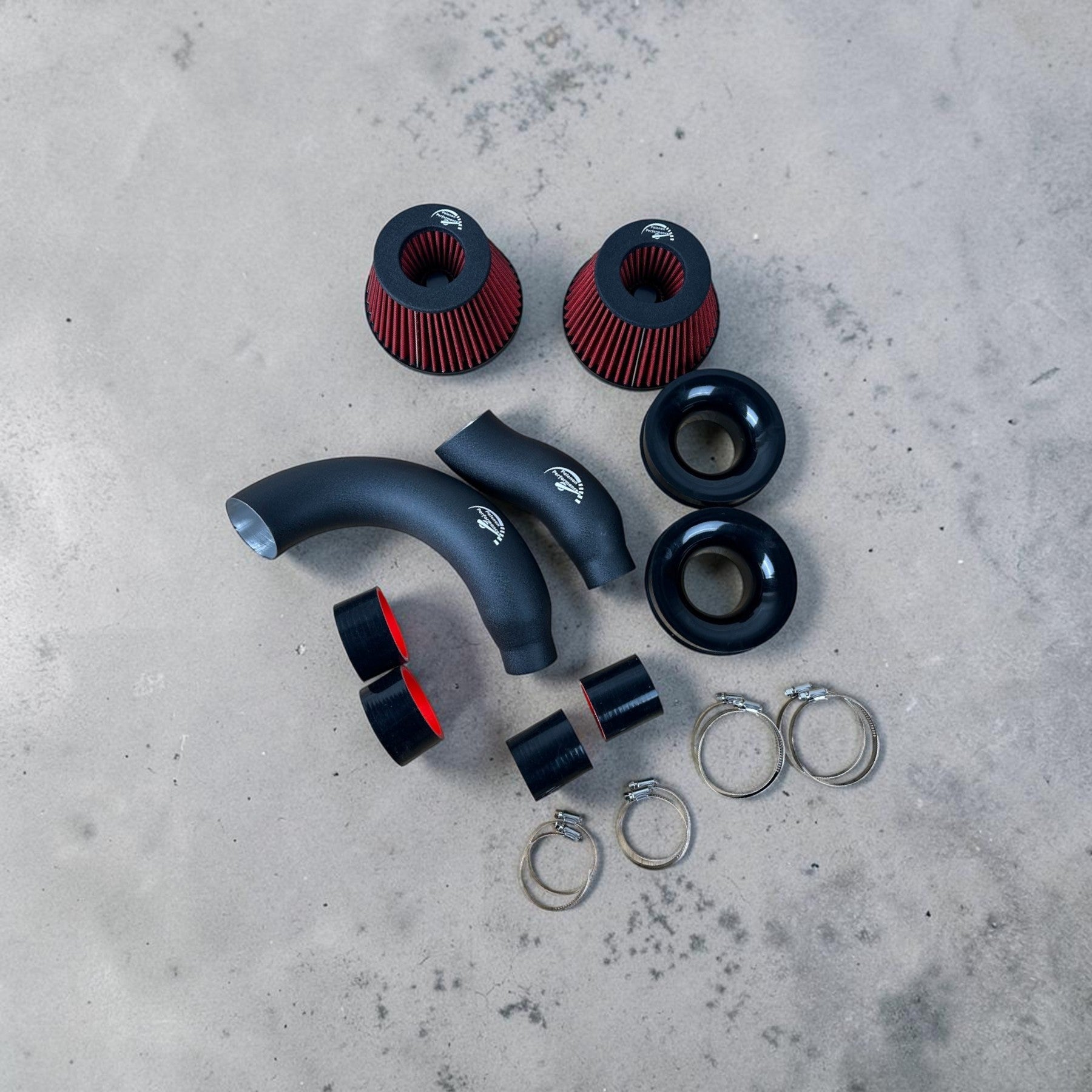 Palenon Performance cold air intake kit for Audi 4.0T featuring red cone filters, black aluminum pipes, and couplers.