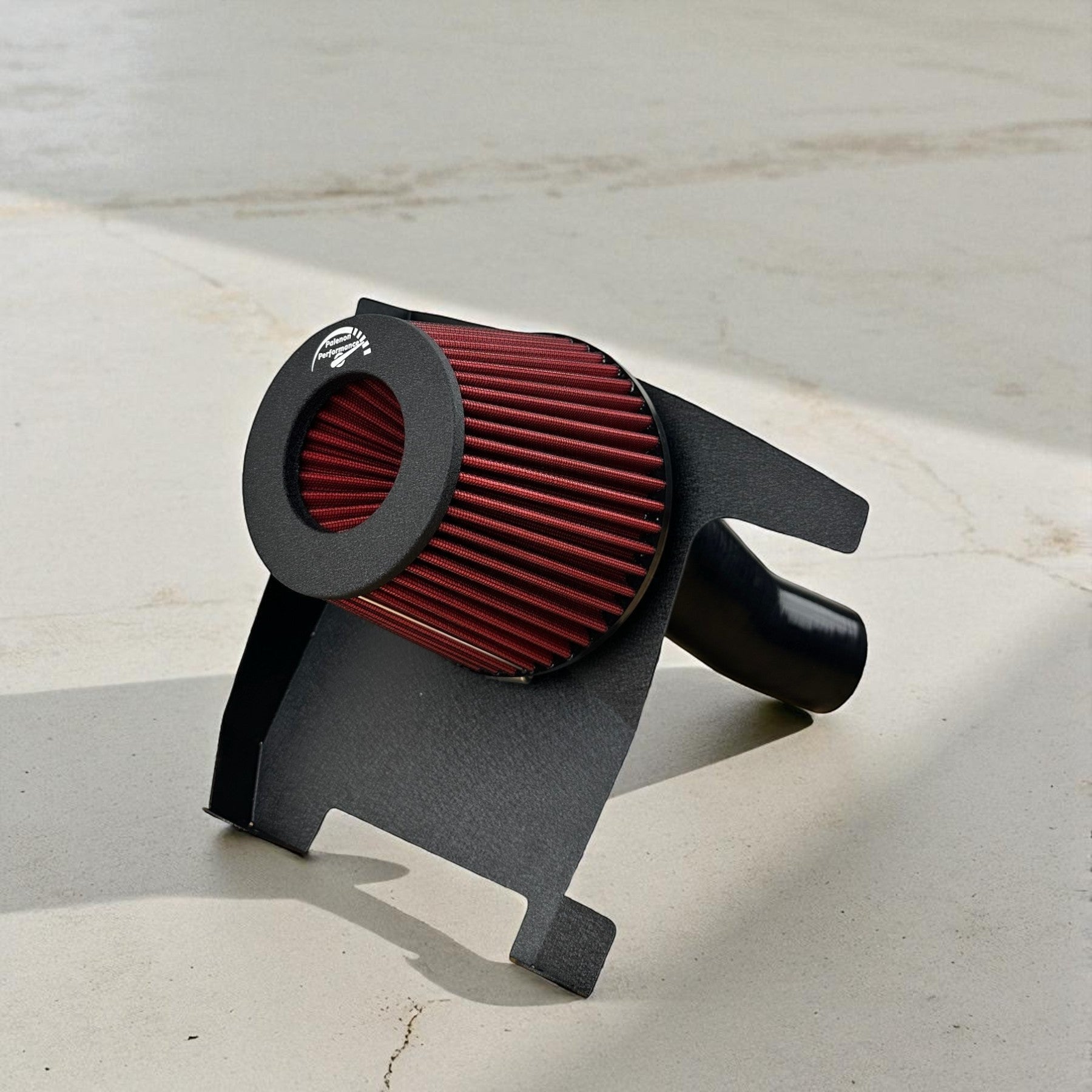 Palenon Performance cold air intake with red velocity stack filter and black heat shield for Audi B9 3.0T engines