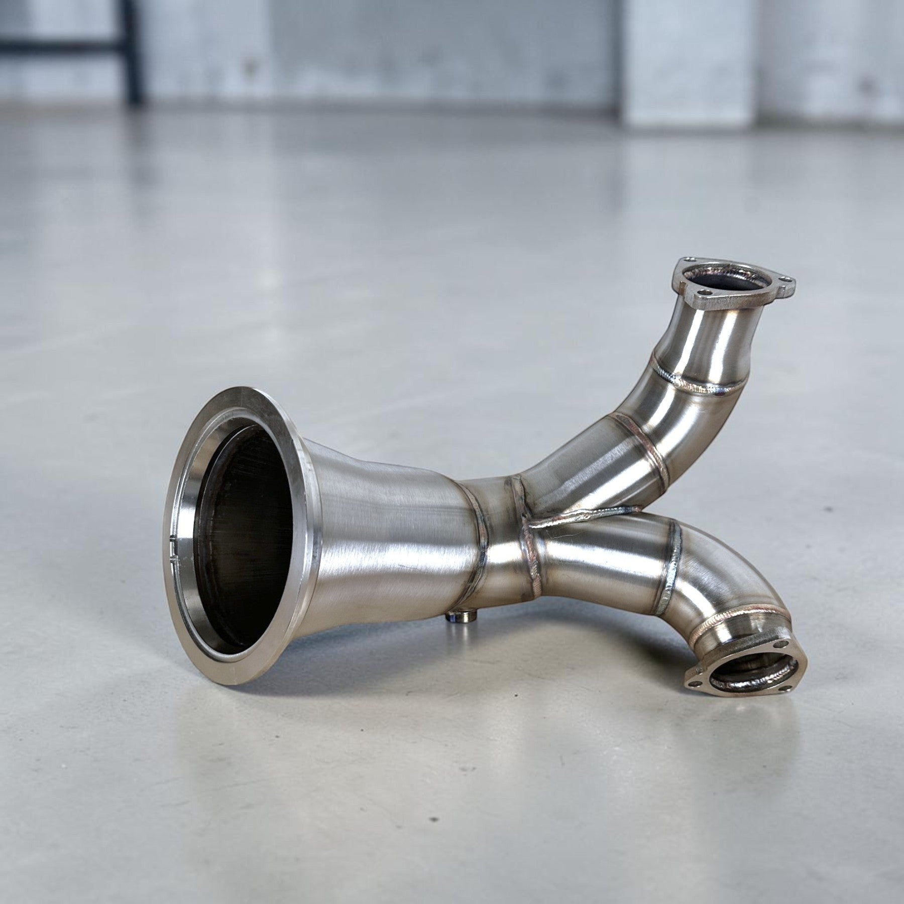 Palenon Performance stainless steel racing downpipe for Audi S4 and S5, featuring TIG-welded construction.