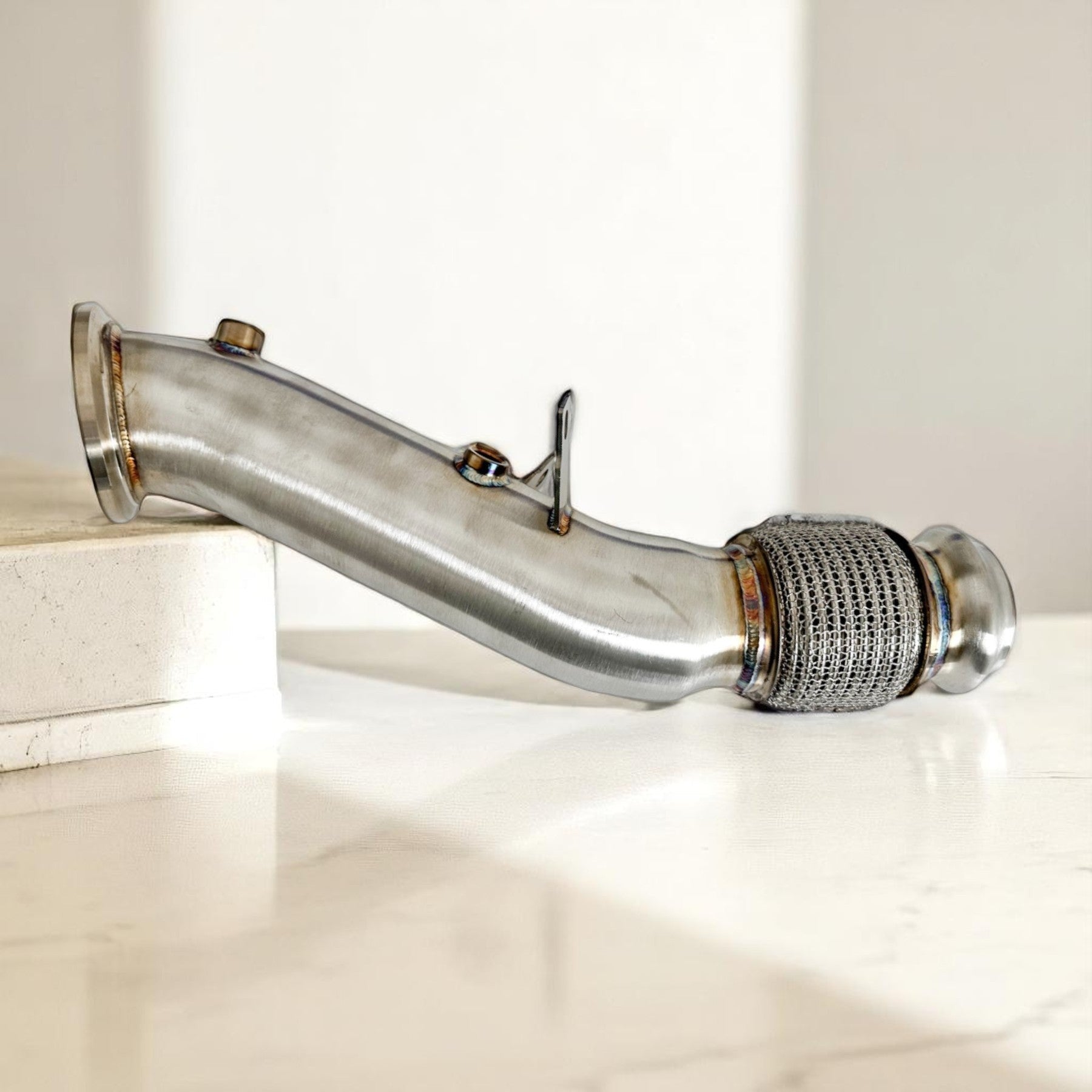 Palenon Performance B46 B48 racing downpipe made of 304 stainless steel with a flexible braided section