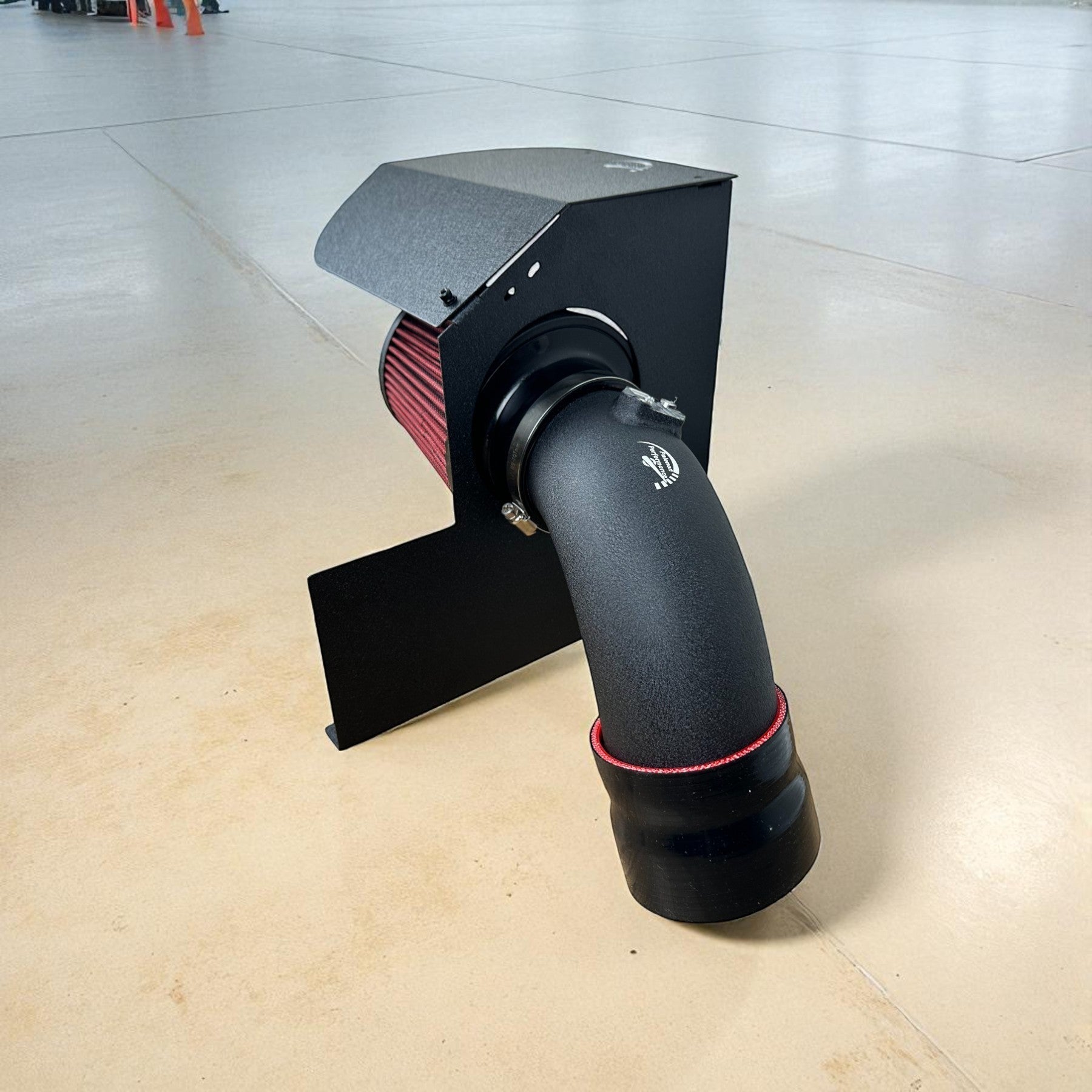 Palenon Performance B58 cold air intake with black aluminum tube, red cotton filter, and integrated heat shield for BMW