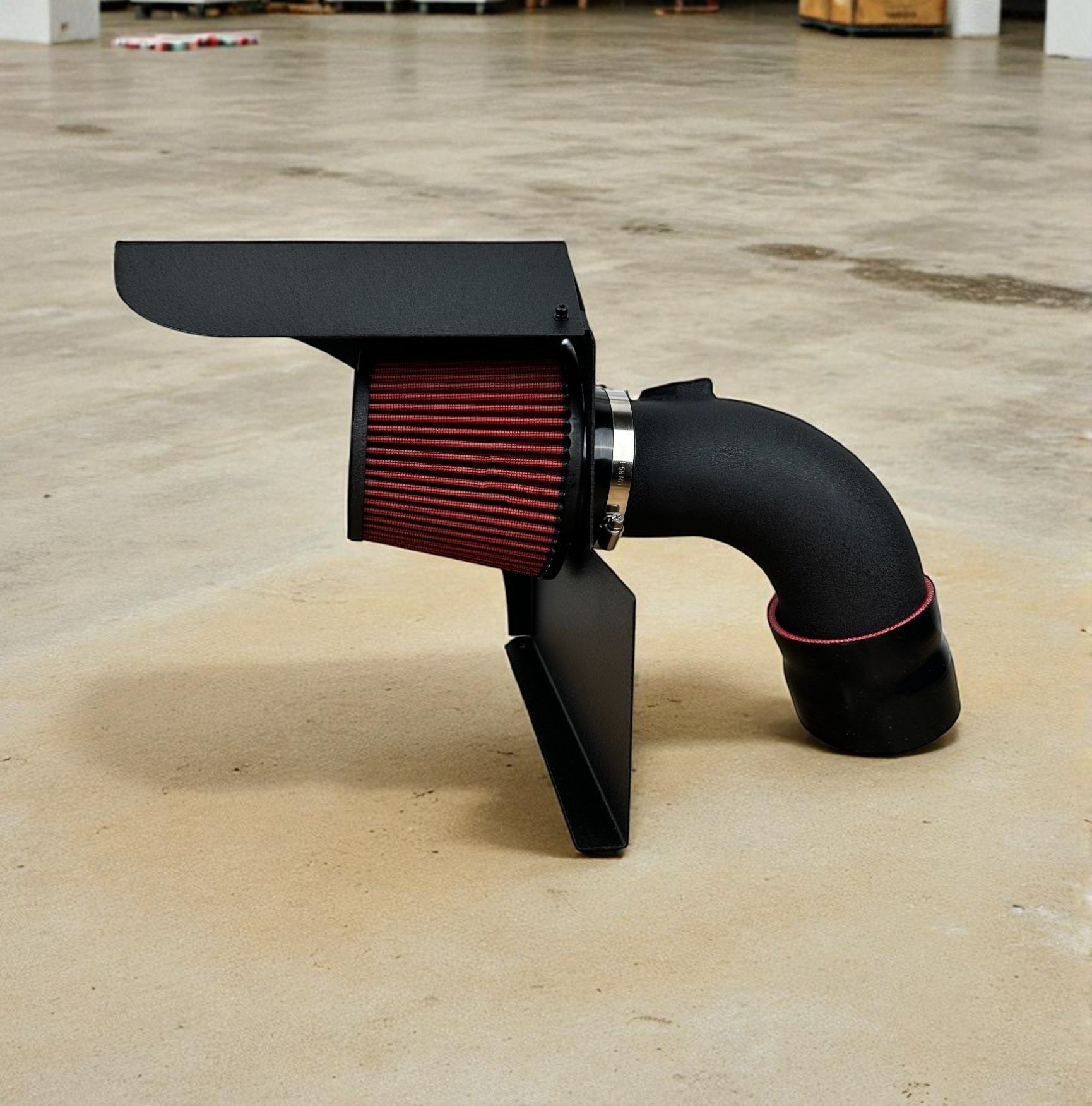 Palenon Performance B58 cold air intake with red cotton filter, black aluminum tube, and integrated heat shield.