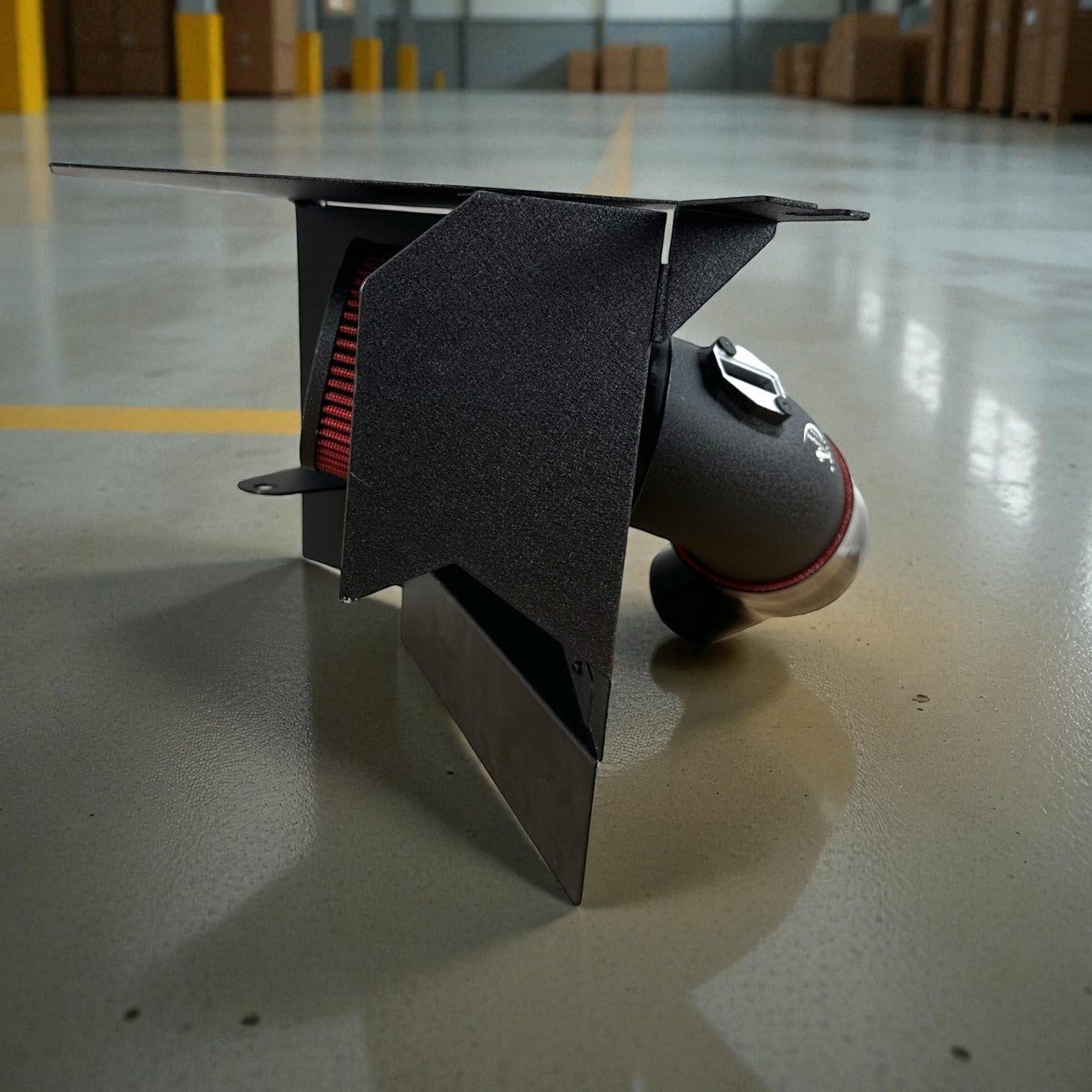 Palenon Performance B58 cold air intake for Toyota Supra with black powder-coated pipe, heat shield, and red filter.