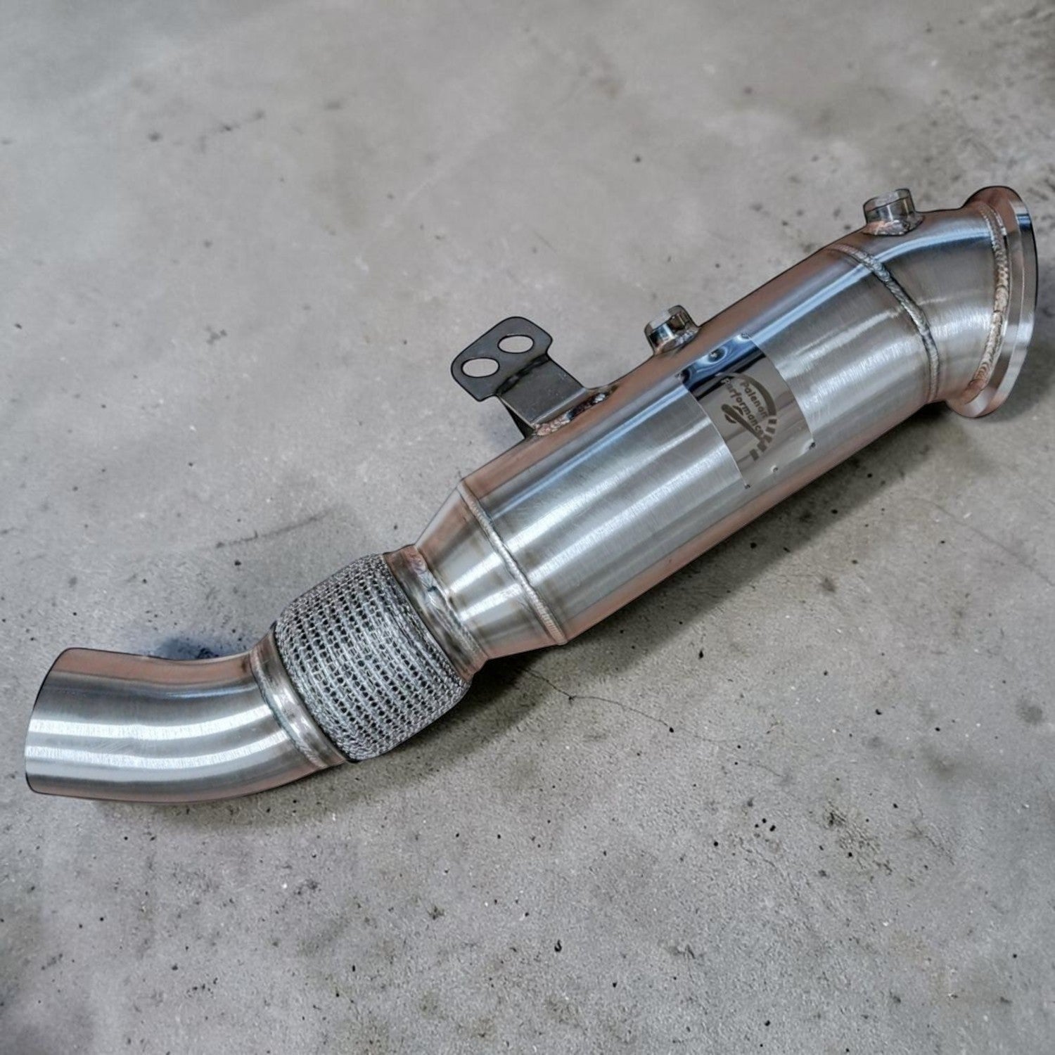 Palenon Performance 4.5 inch stainless steel B58 racing downpipe for BMW and Toyota Supra engines.