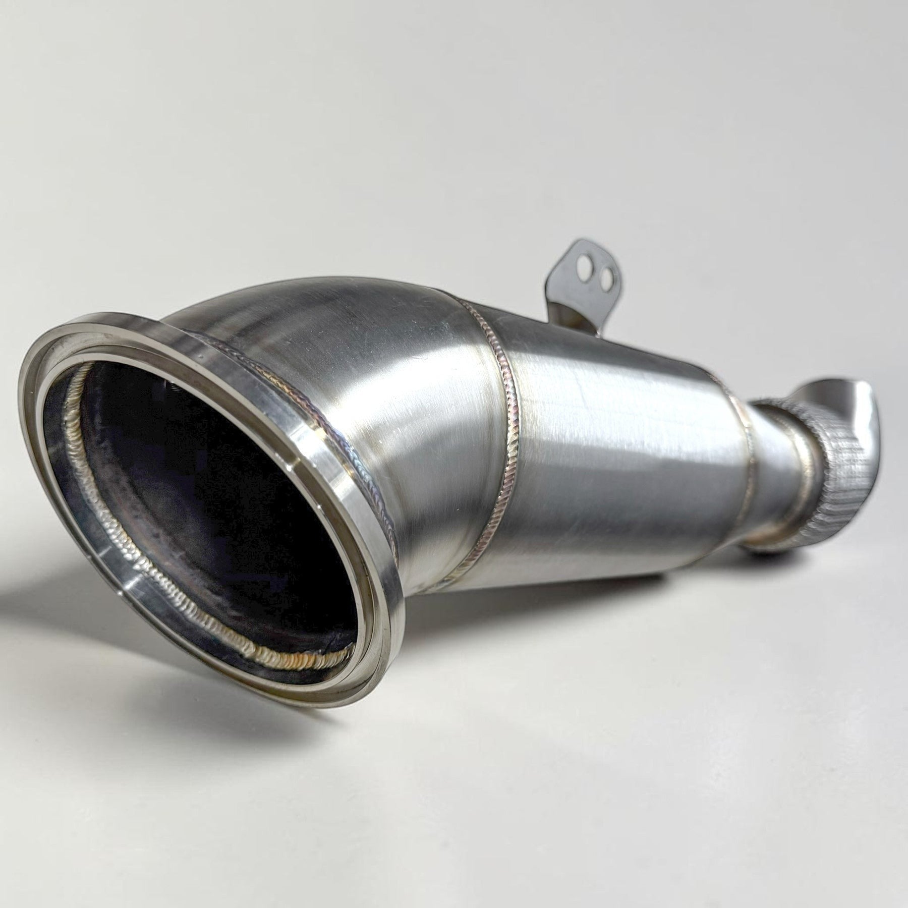 Palenon Performance 4.5-inch stainless steel racing downpipe for BMW B58 engines, featuring smooth mandrel bends.
