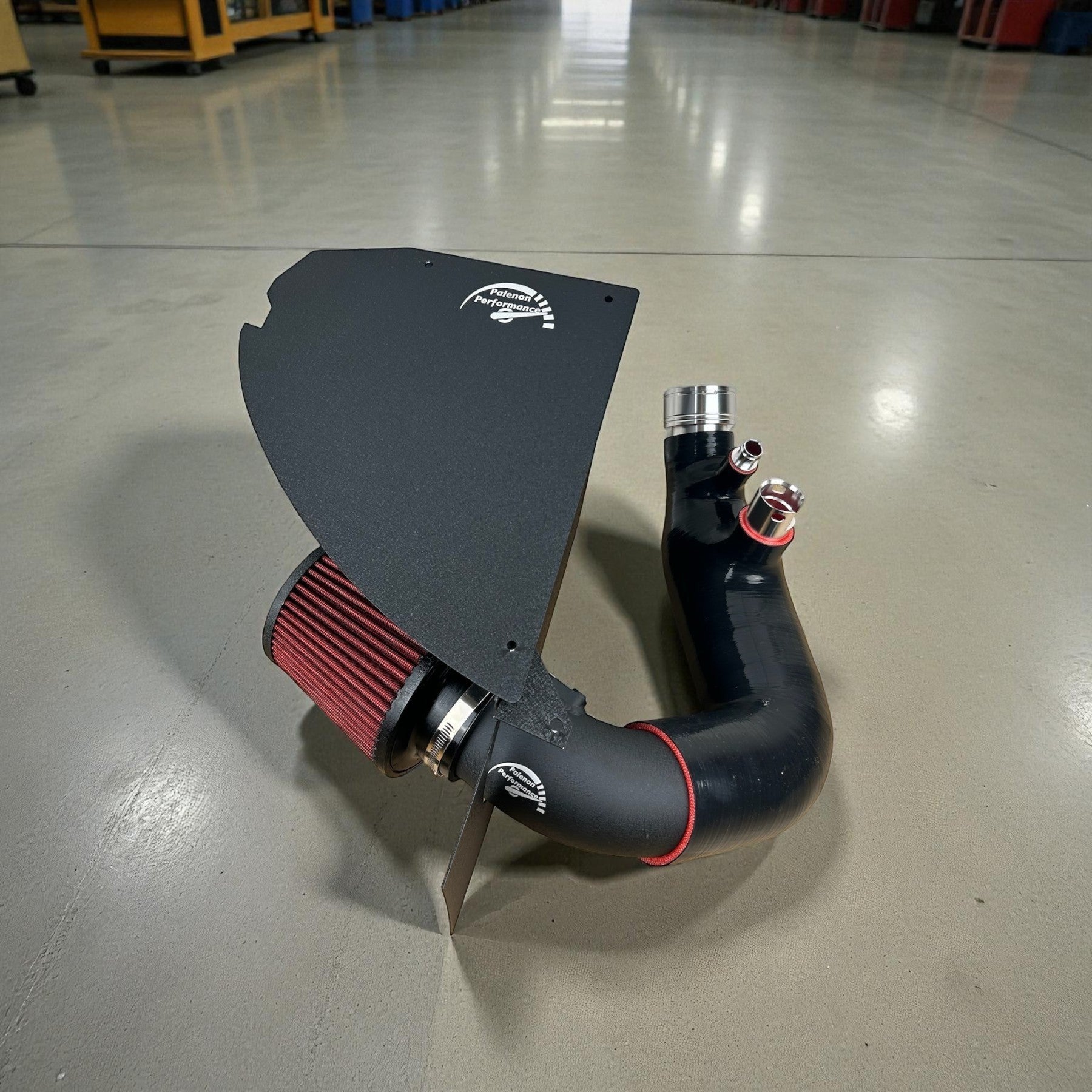 Palenon Performance cold air intake system for BMW B48 engine featuring a black pipe, red air filter, and heat shield