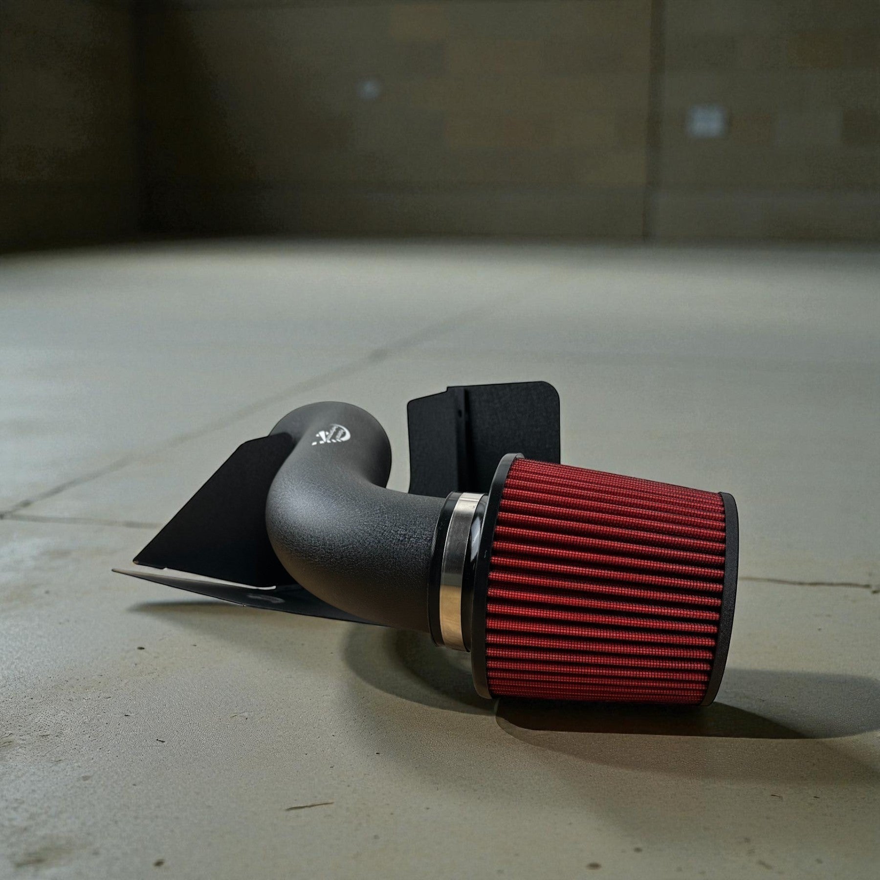 Palenon Performance cold air intake system with black powder-coated aluminum pipe and red dry cone air filter.