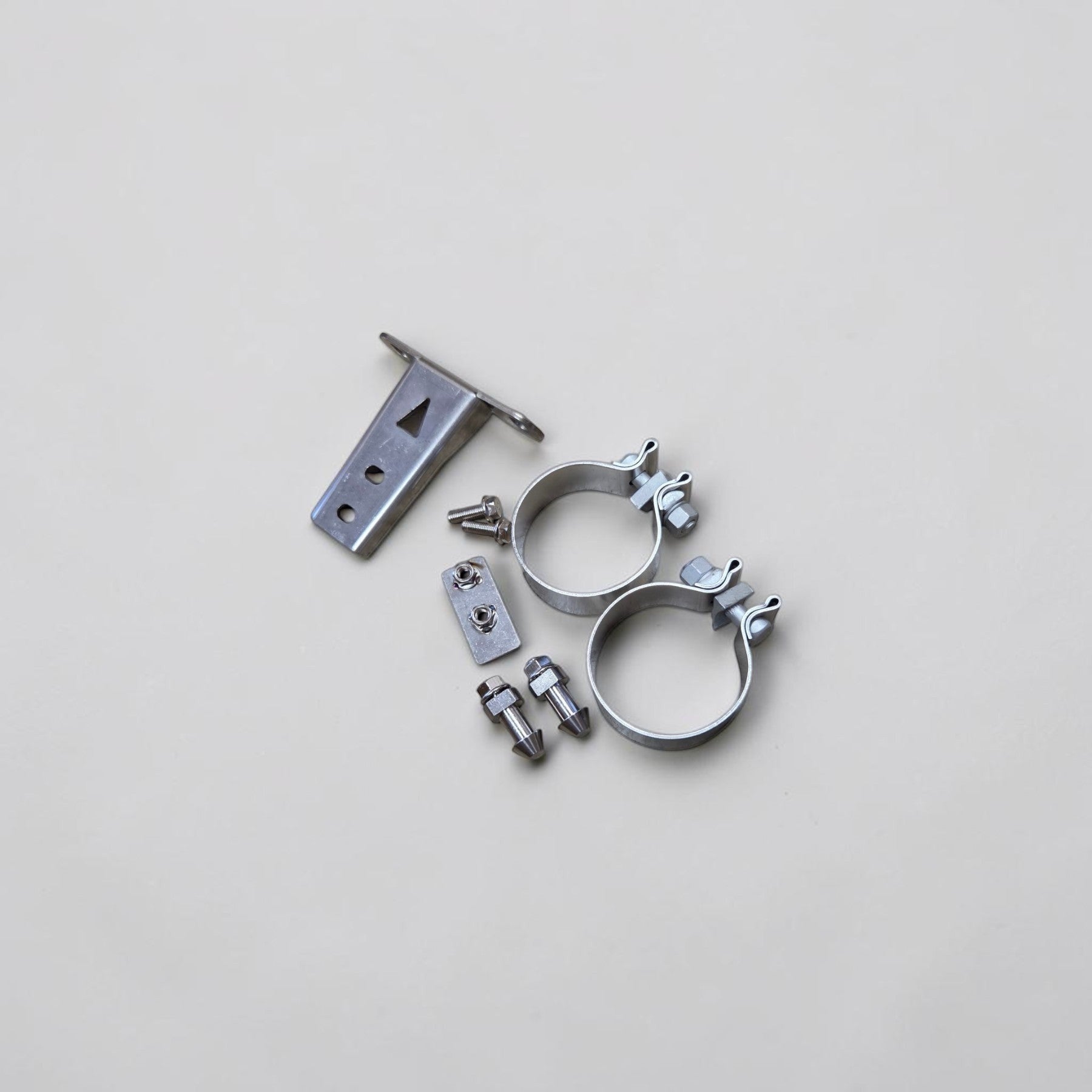 Palenon Performance stainless steel mounting hardware, brackets, and clamps for VW MK8 GTI and Audi 8Y A3 downpipes.