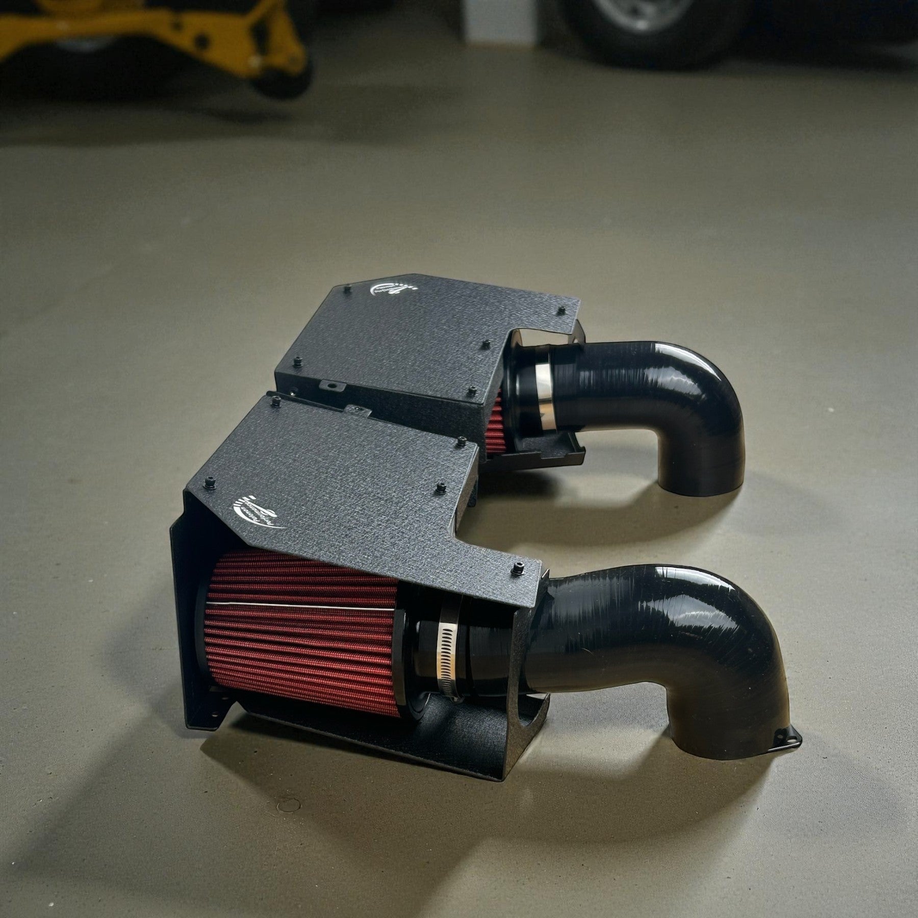 Palenon Performance dual cold air intake system with black aluminum heat shields and red cone filters for M276 engine