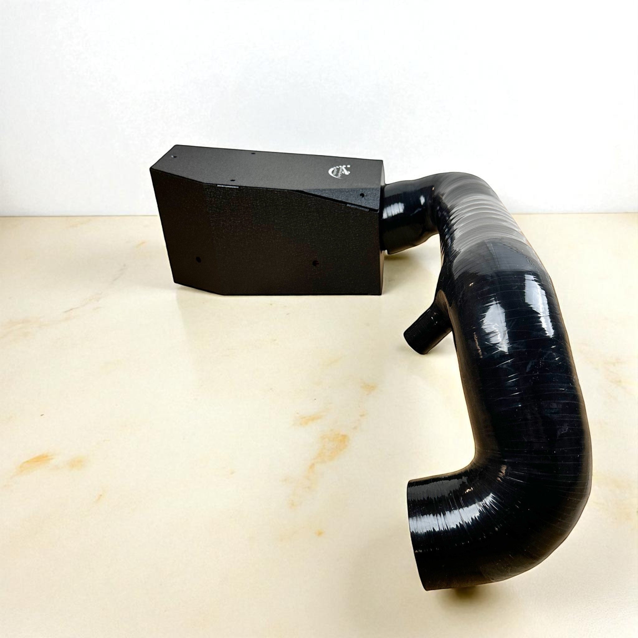 Palenon Performance M264 cold air intake with black powder-coated heat shield and glossy black silicone intake hose.