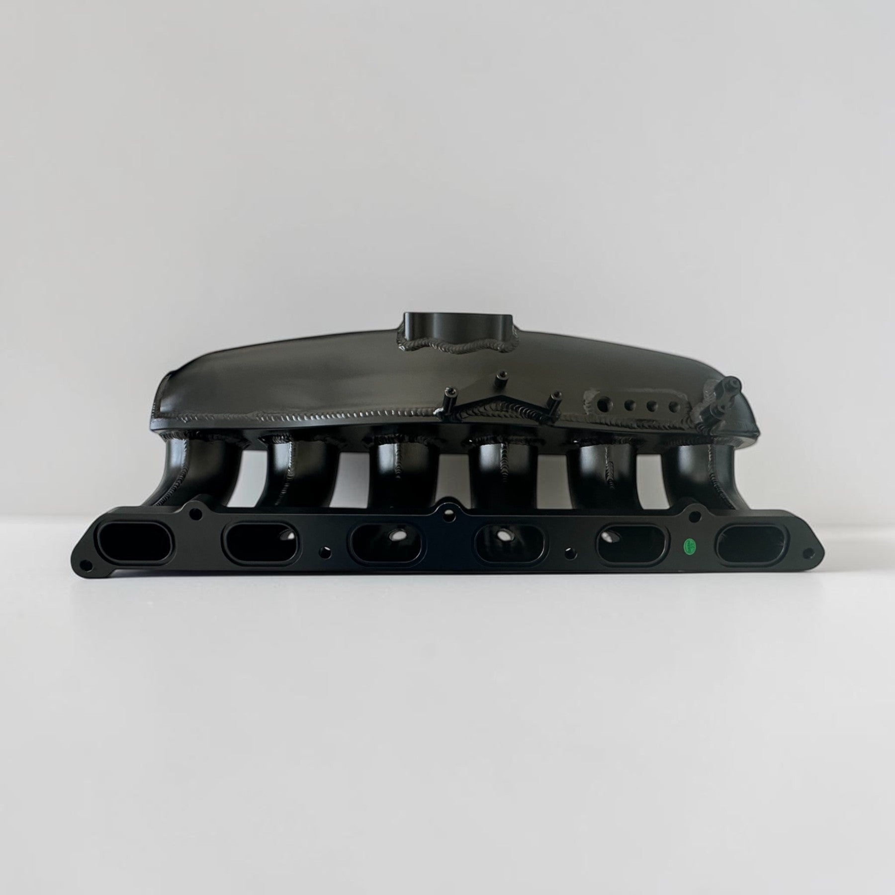 Palenon Performance black aluminum intake manifold for BMW N54 engines with integrated port injection bungs