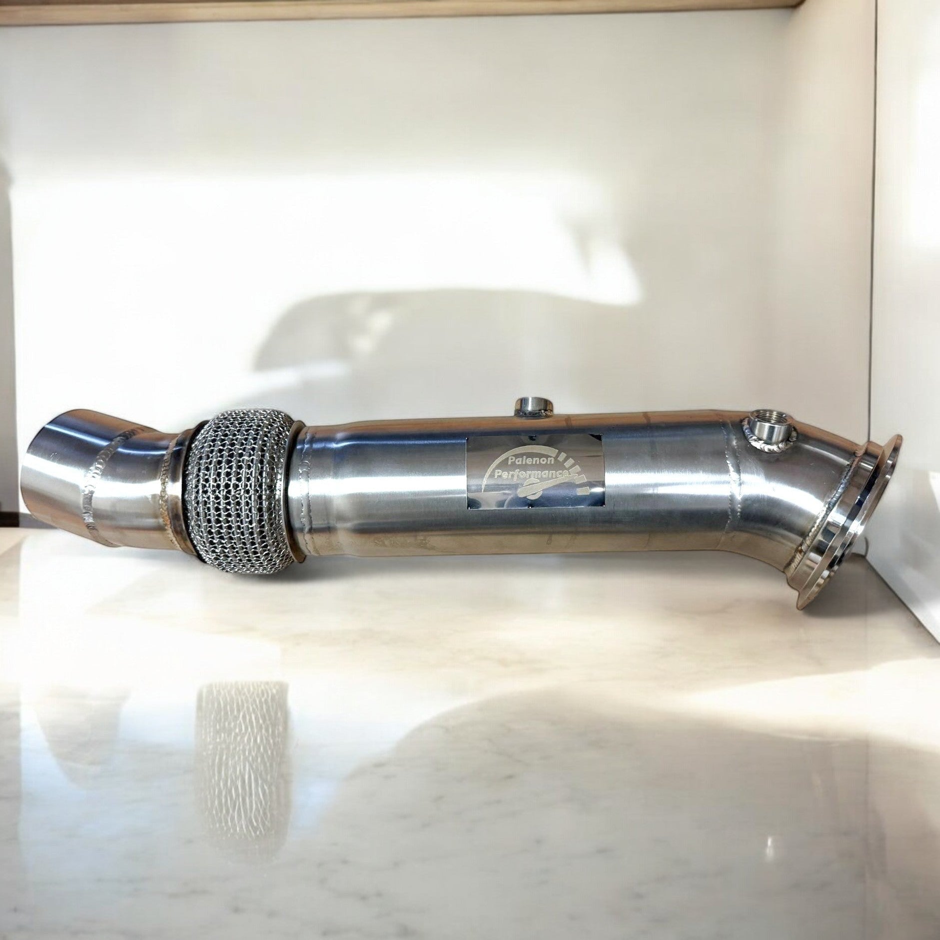 Palenon Performance stainless steel N55 downpipe with TIG-welded finish and flexible mesh section for BMW engines