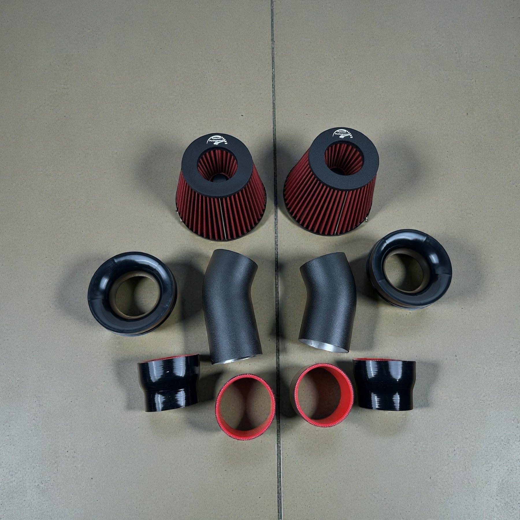 Palenon Performance N63tu3 cold air intake kit with black aluminum pipes, red velocity stack filters, and silicone couplers