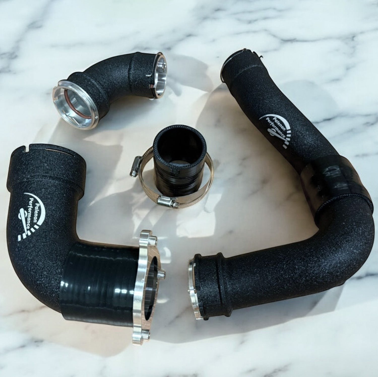 Palenon Performance aluminum S58 charge pipes in matte black for BMW G8X and F9X models with CNC-machined flanges.