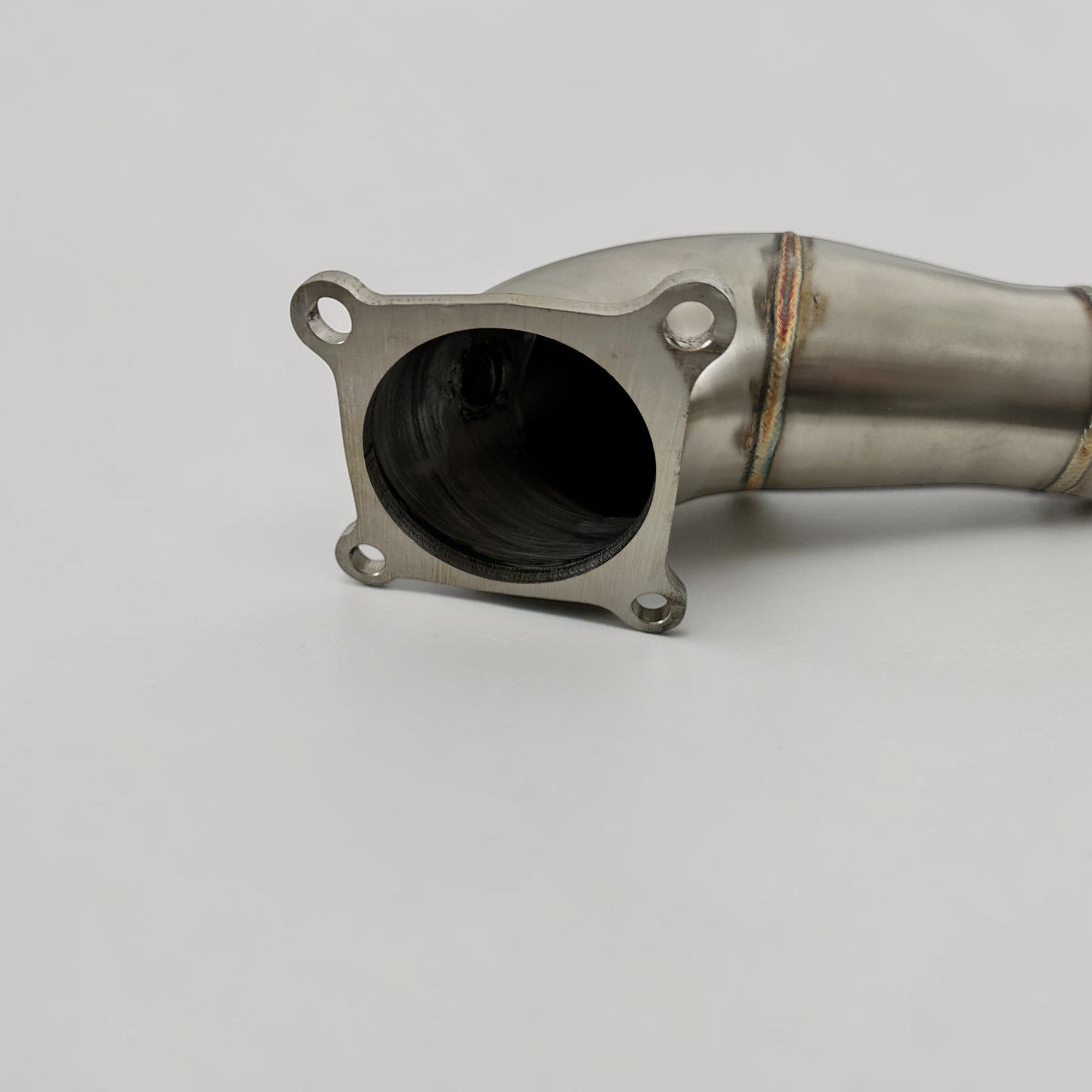 Palenon Performance stainless steel 2.0T race downpipe with CNC-machined turbo flange for Acura vehicles.