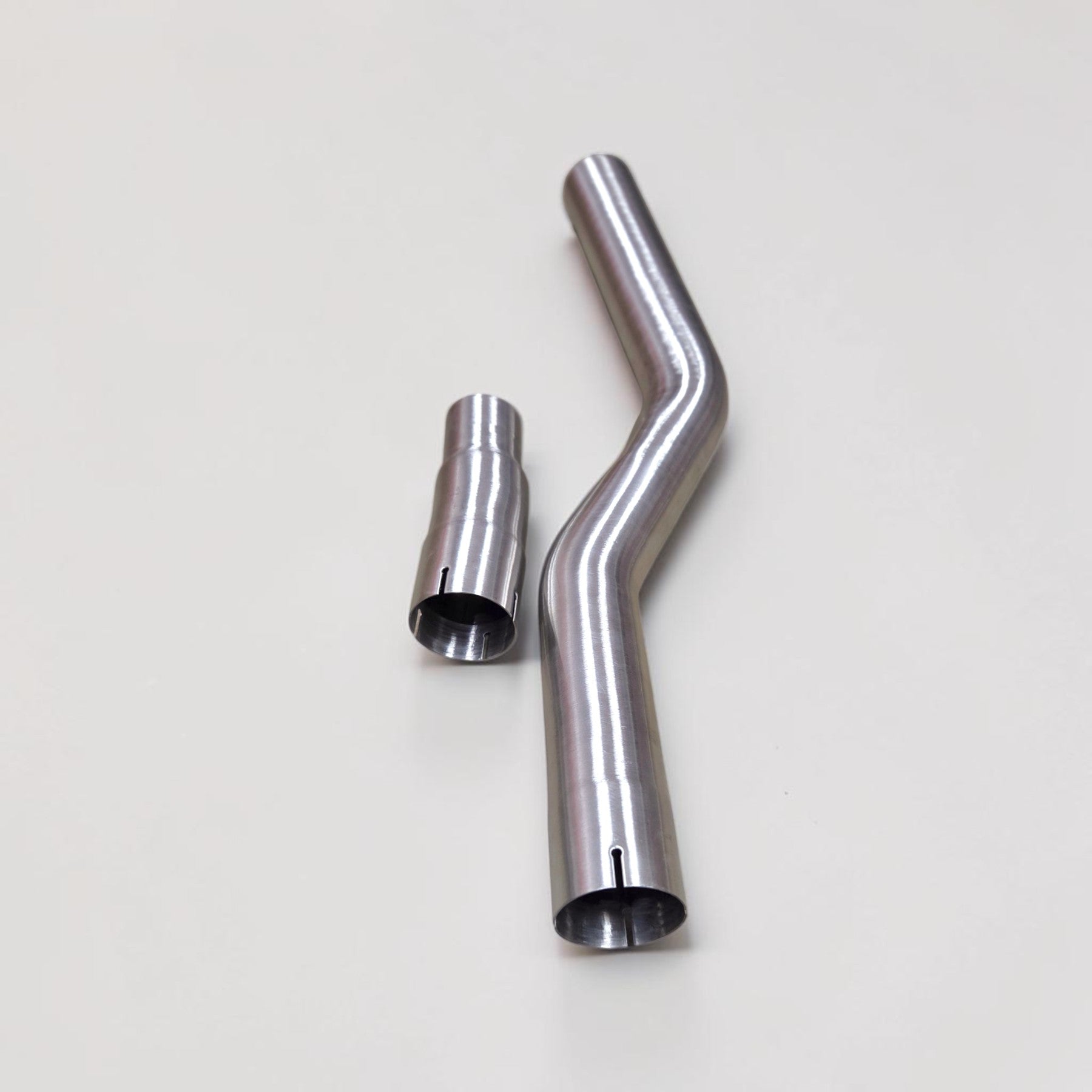 Palenon Performance stainless steel race downpipe components for Audi S3 8Y and VW MK8 Golf R performance upgrades.