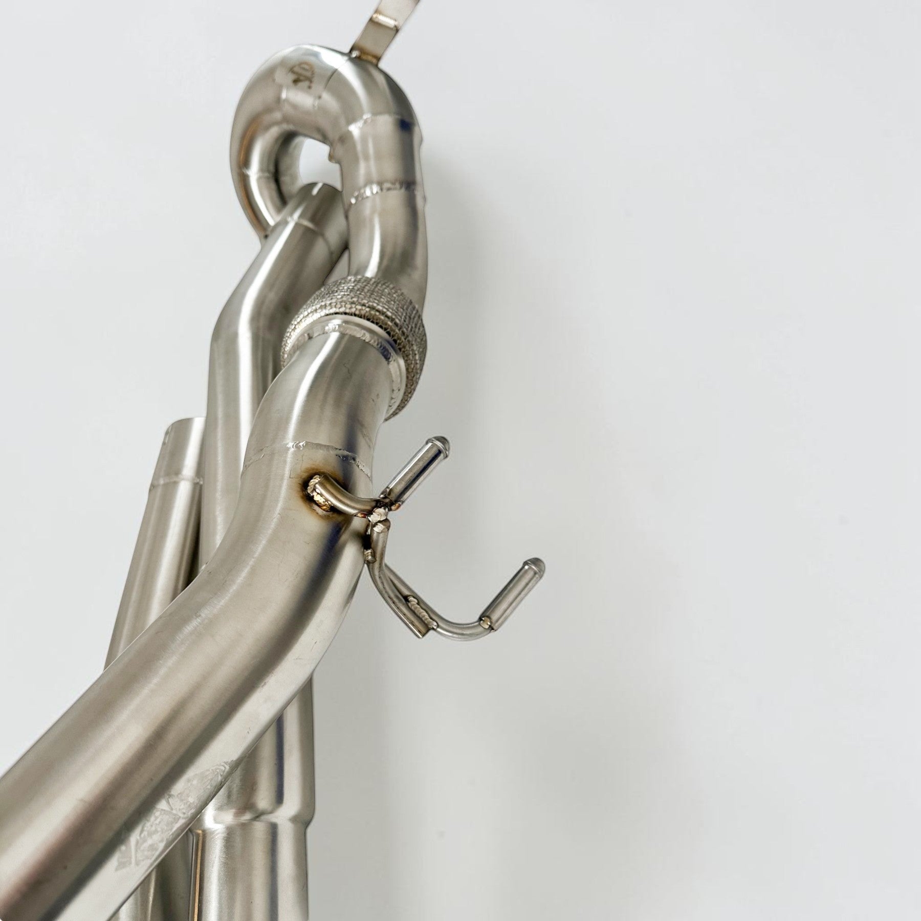Palenon Performance stainless steel race downpipe for Audi S3 8Y and VW MK8 Golf R with TIG-welded construction