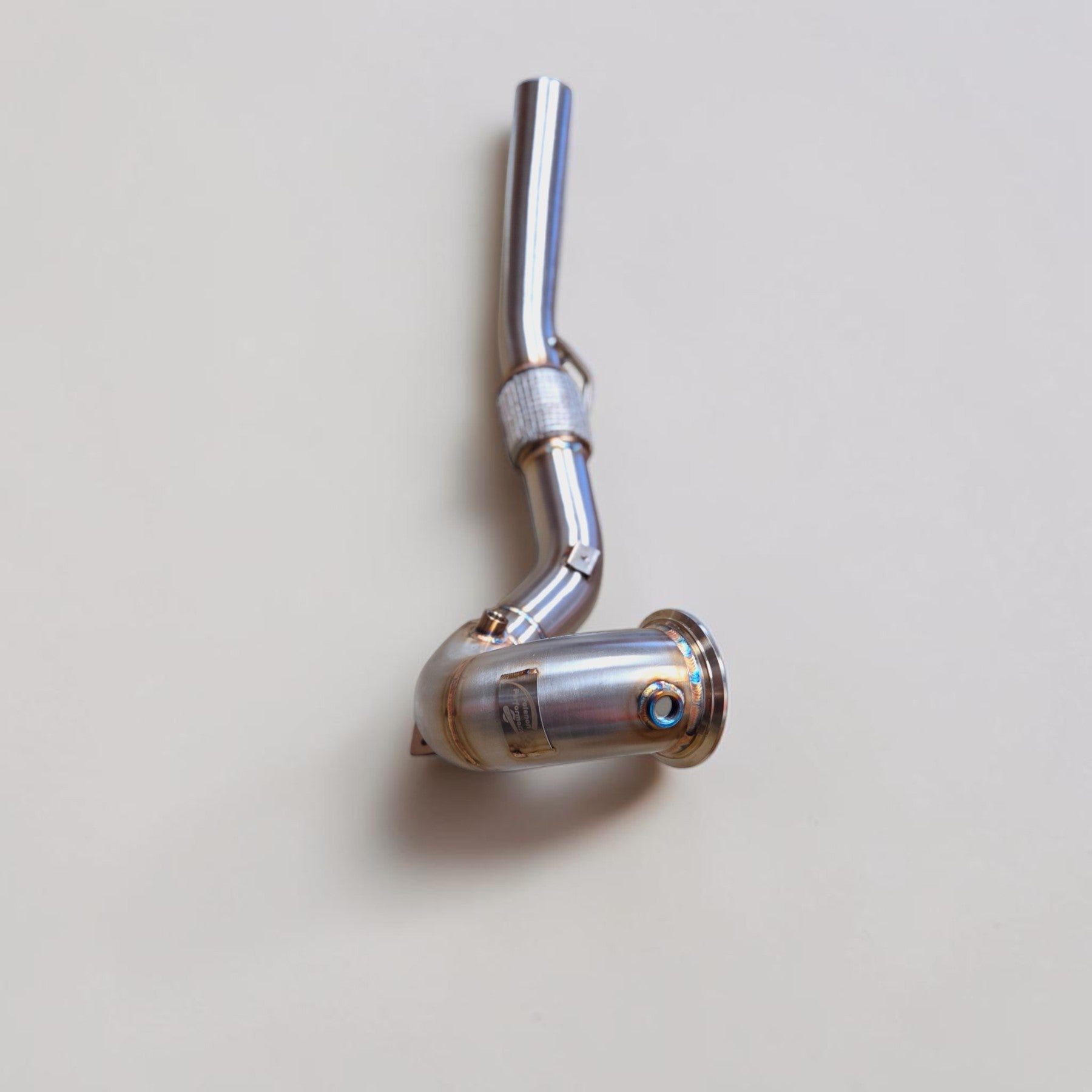Palenon Performance stainless steel race downpipe for Audi S3 8Y and VW MK8 Golf R with TIG-welded construction.