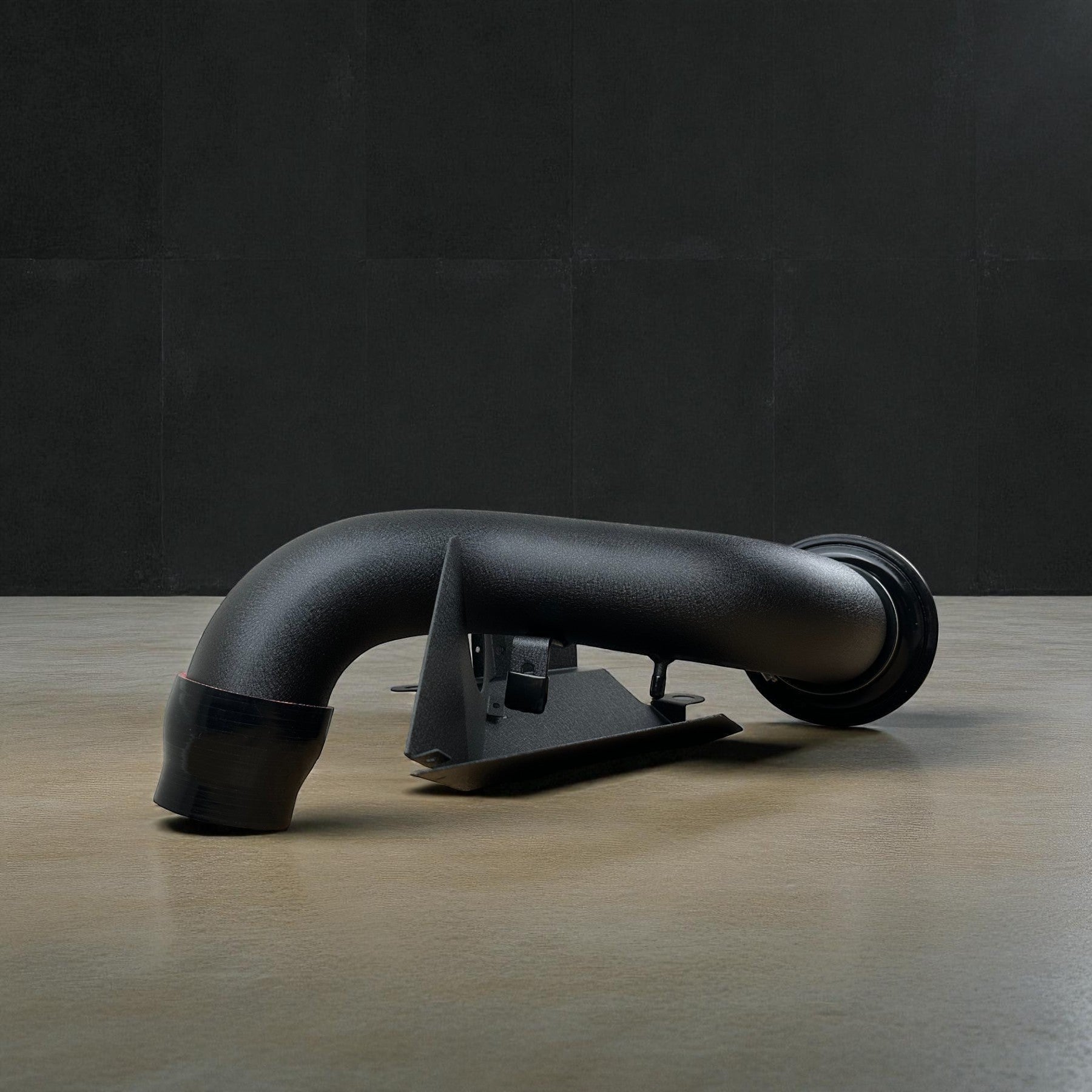 Palenon Performance black powder-coated aluminum cold air intake pipe for VW MK7 GTI and Golf R engines.