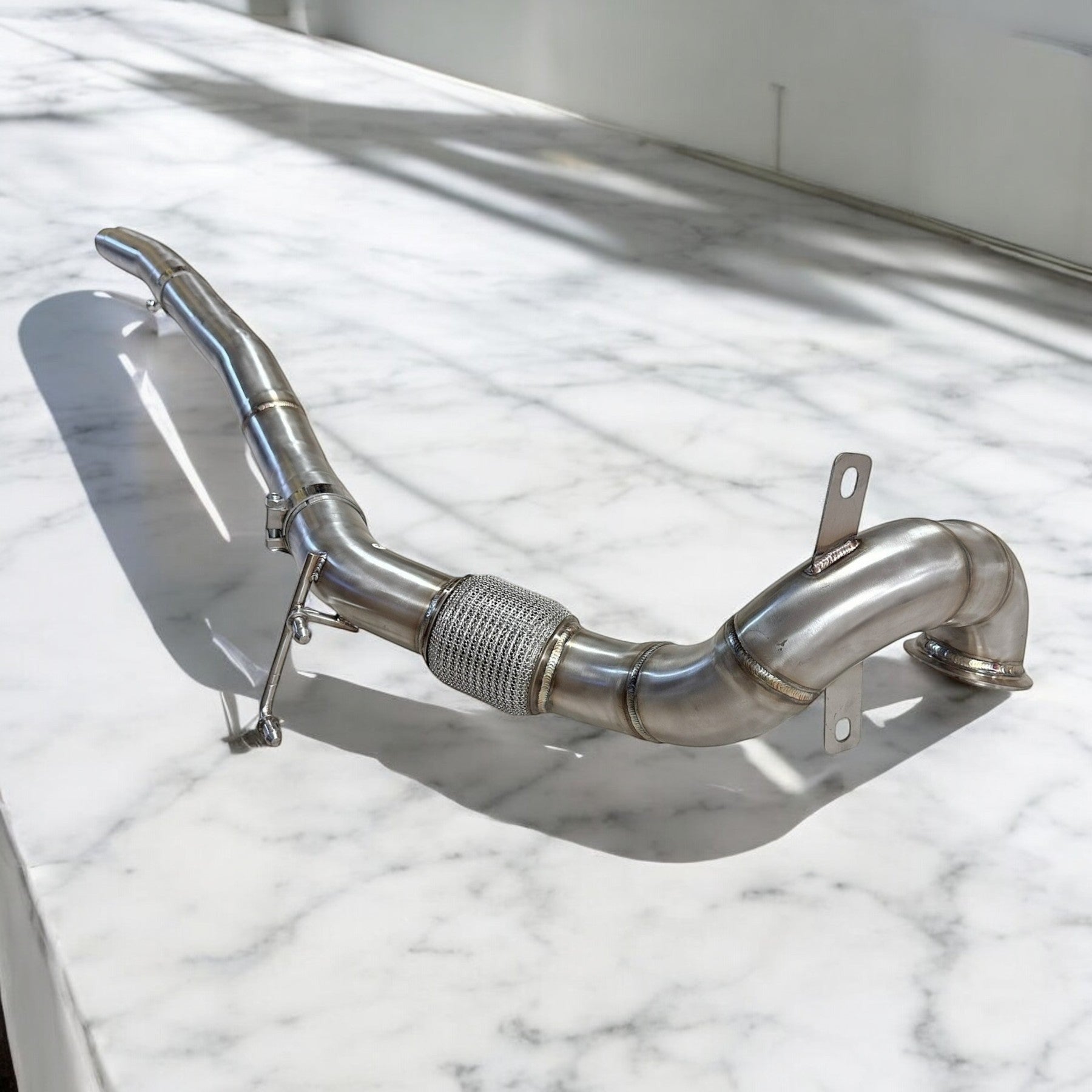 Palenon Performance stainless steel racing downpipe for VW MK7 Golf R with TIG-welded joints and flex section