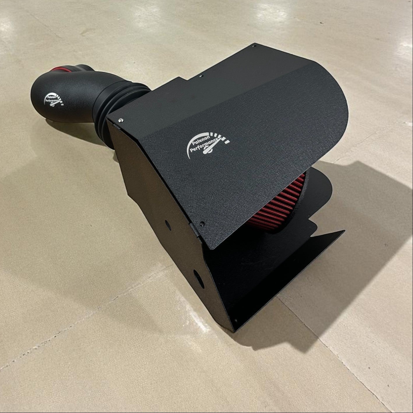 Palenon Performance cold air intake system with black powder-coated heat shield and red cone filter for VW MK8 GTI